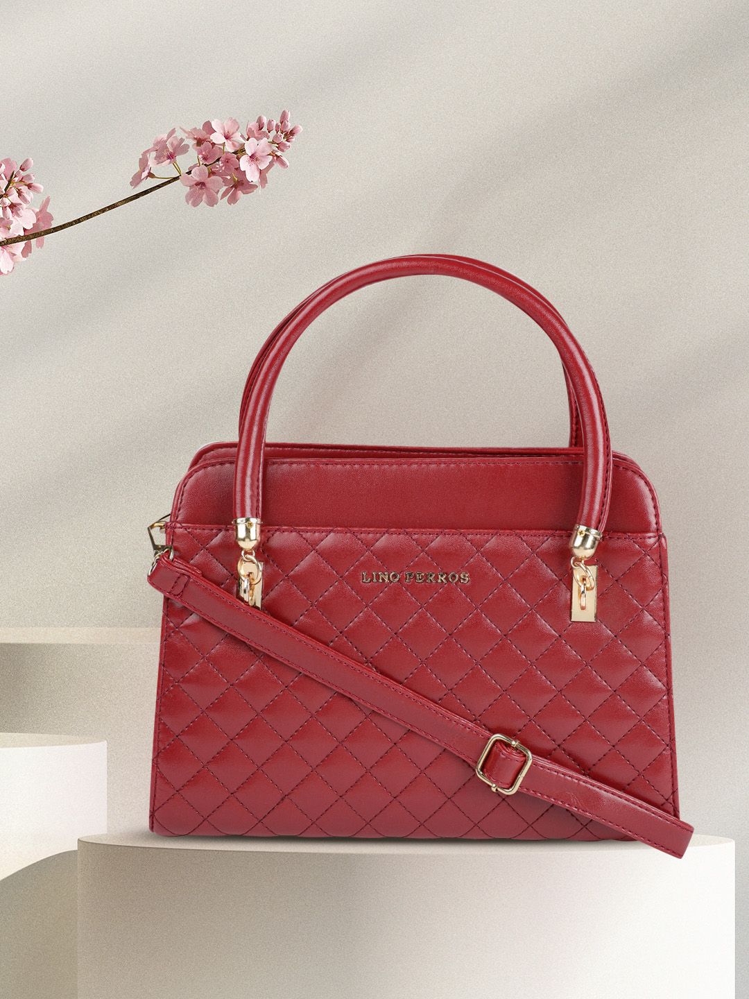 Lino Perros Red Quilted Handheld Bag Price in India