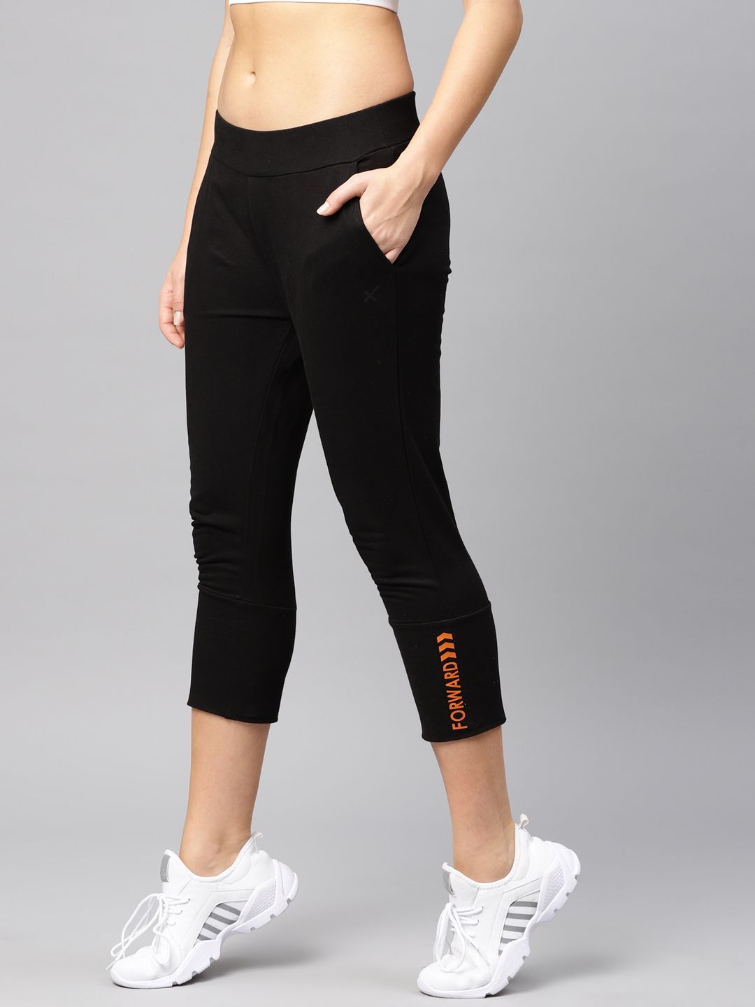 HRX by Hrithik Roshan Women Black Active Solid Straight Fit 3/4th Track Pants Price in India