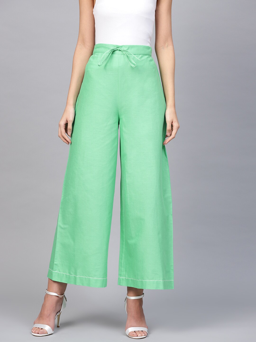 W Women Green Solid Cropped Wide Leg Palazzos Price in India