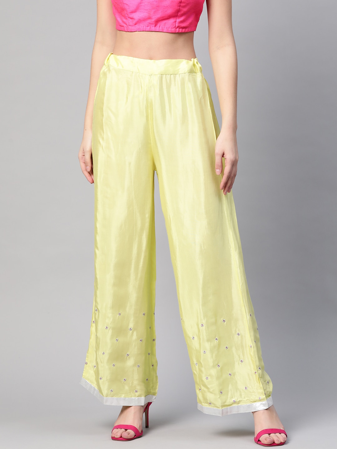WISHFUL by W Women Lime Green Solid Straight Palazzos Price in India