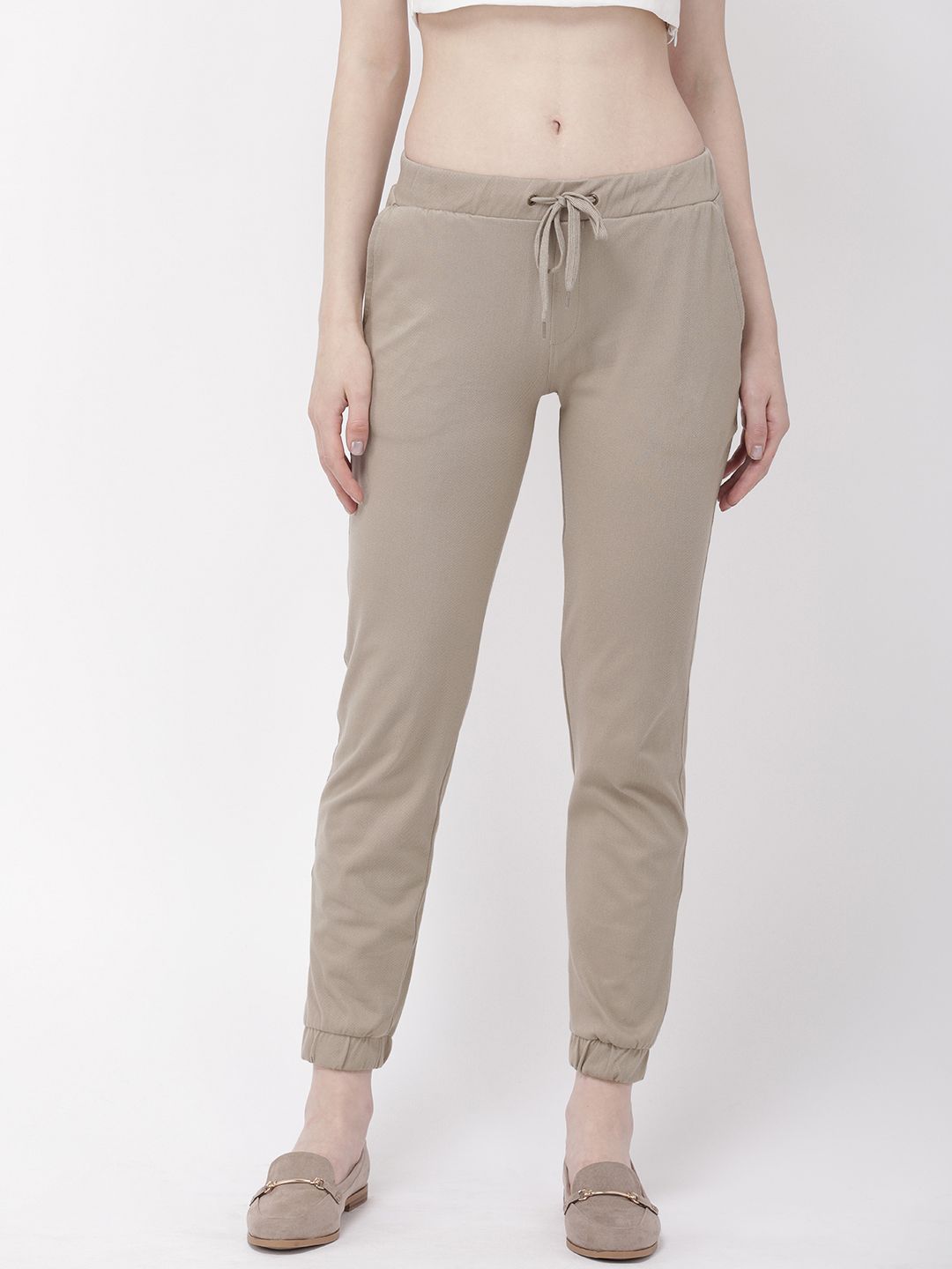 Go Colors Women Khaki Regular Fit Solid Joggers Price in India