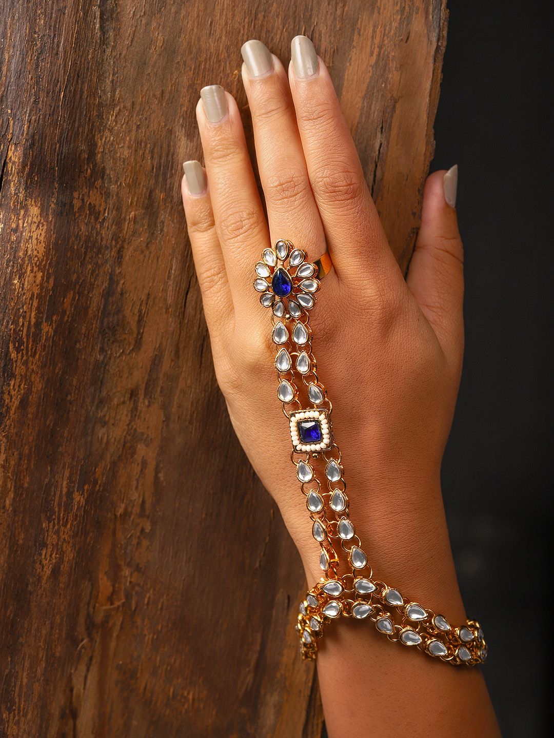 Zaveri Pearls Gold-Toned & Navy Kundan Blue Ring Bracelet Price in India