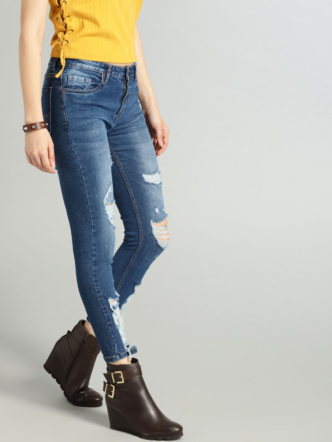 The Roadster Lifestyle Co Women Blue Skinny Fit Mid-Rise Mildly Distressed Stretchable Jeans Price in India