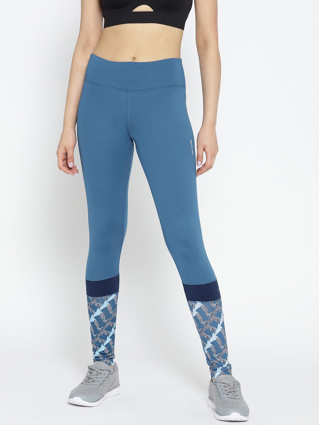 Alcis Women Teal Blue Solid Running Tights with Printed Detail Price in India