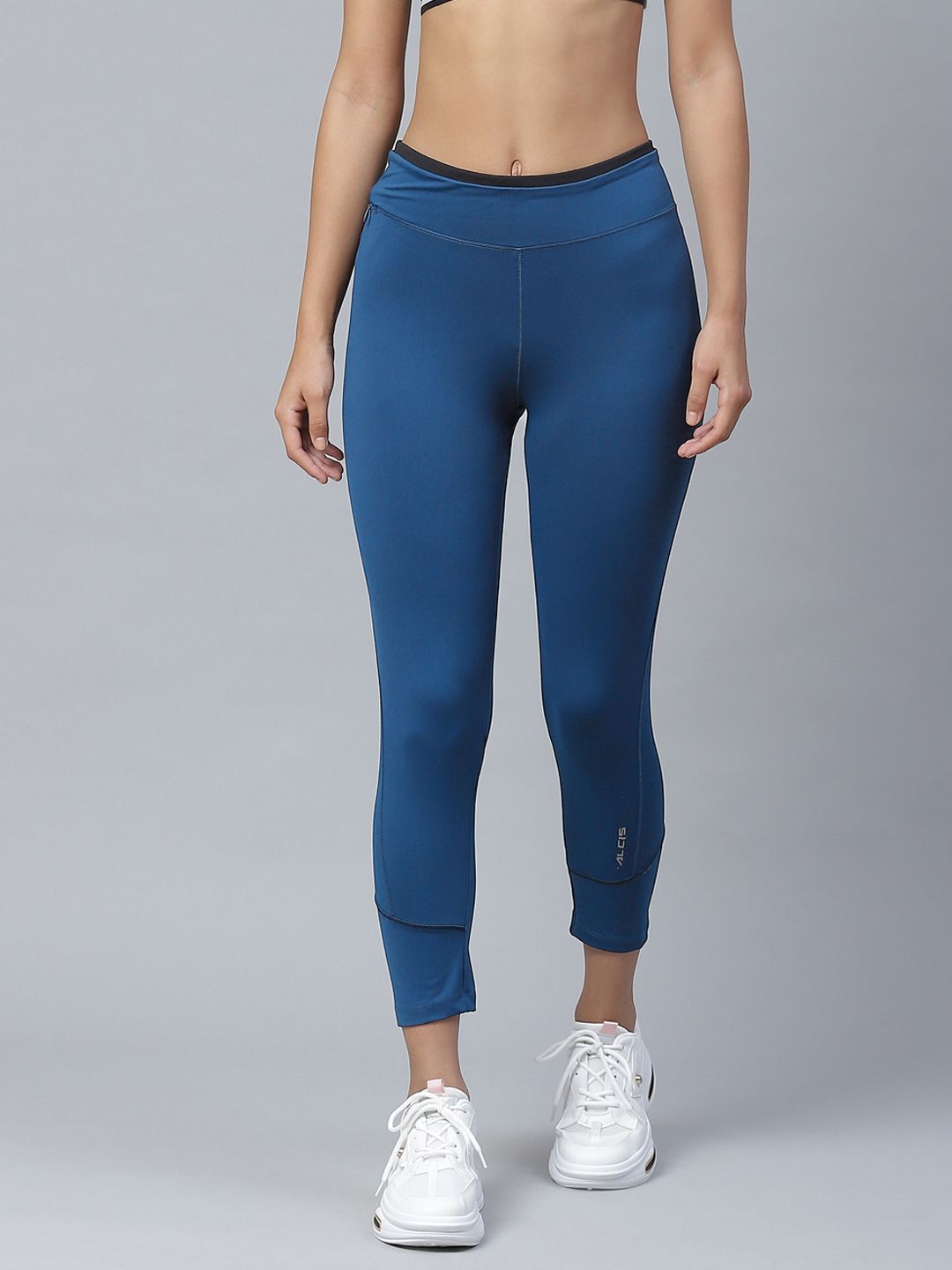 Alcis Women Teal Blue Solid Knitted Running Tights Price in India