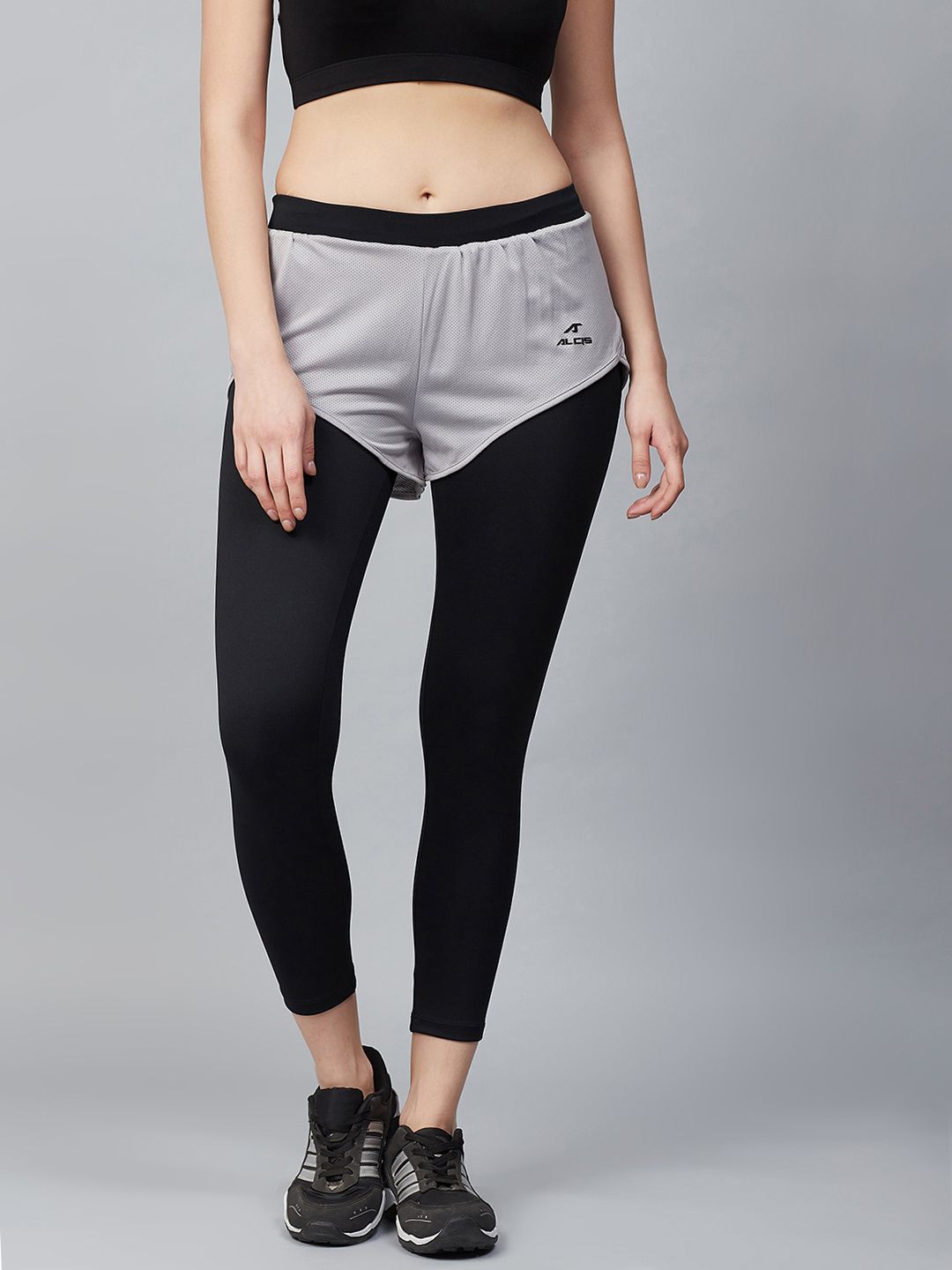 Alcis Women Black & Grey Colourblocked Cropped Running Tights Price in India