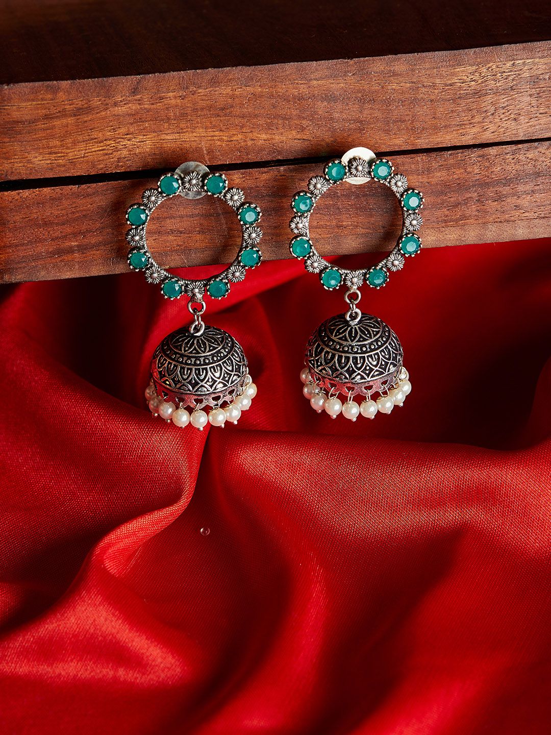 PANASH Silver-Plated & Green Dome Shaped Oxidised Jhumkas Price in India