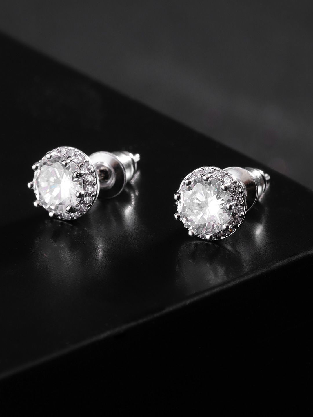 Carlton London Silver-Toned Rhodium Plated CZ Studded Circular Studs Price in India