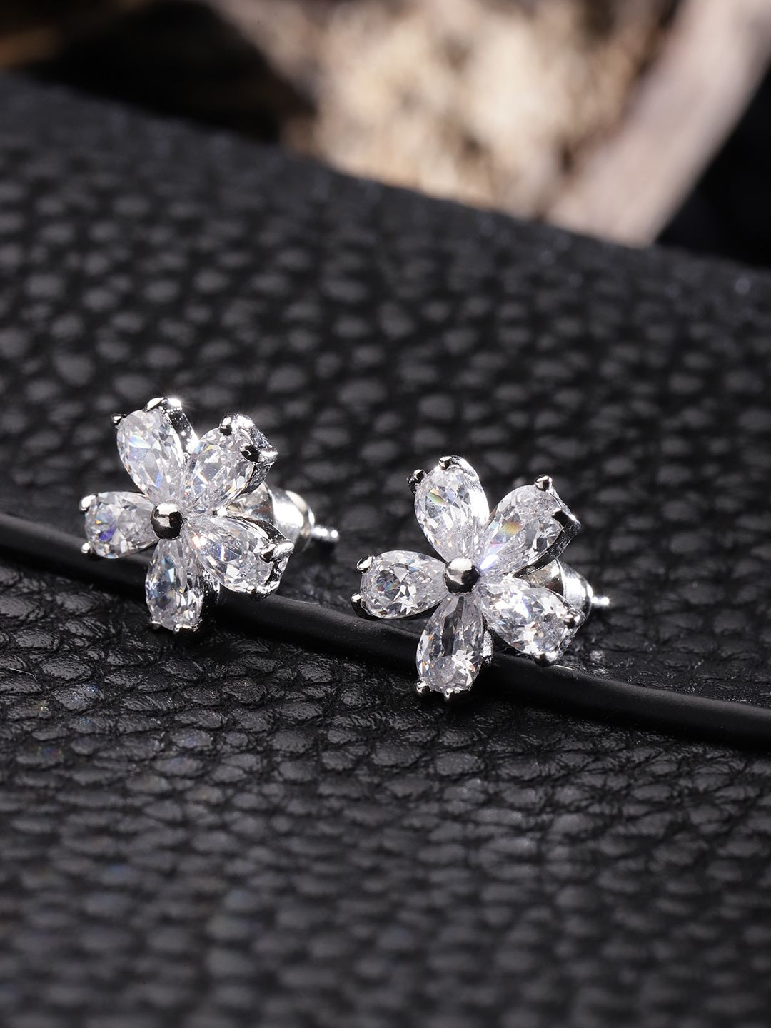 Carlton London Silver-Toned Rhodium-Plated CZ Studded Floral Studs Price in India