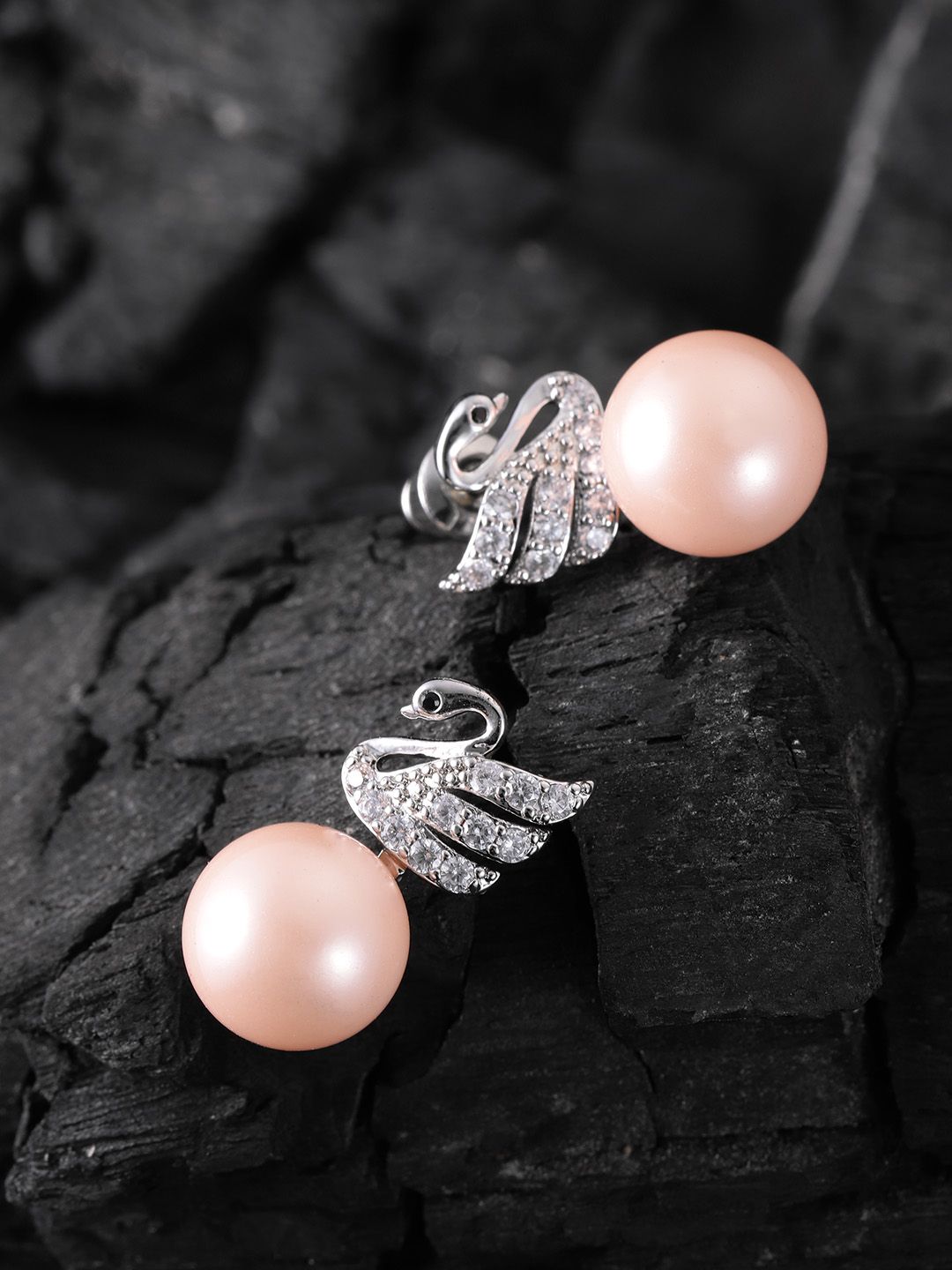 Carlton London Silver-Toned & Peach-Coloured Rhodium-Plated CZ Swan-Shaped Studs Price in India