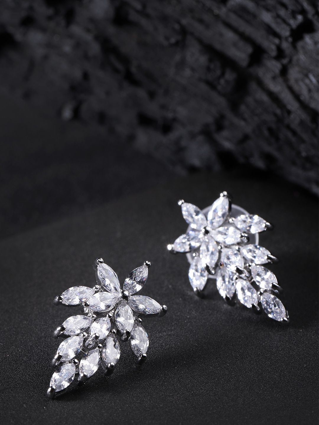 Carlton London Silver-Toned Rhodium-Plated CZ Stone-Studded Leaf-Shaped Studs Price in India