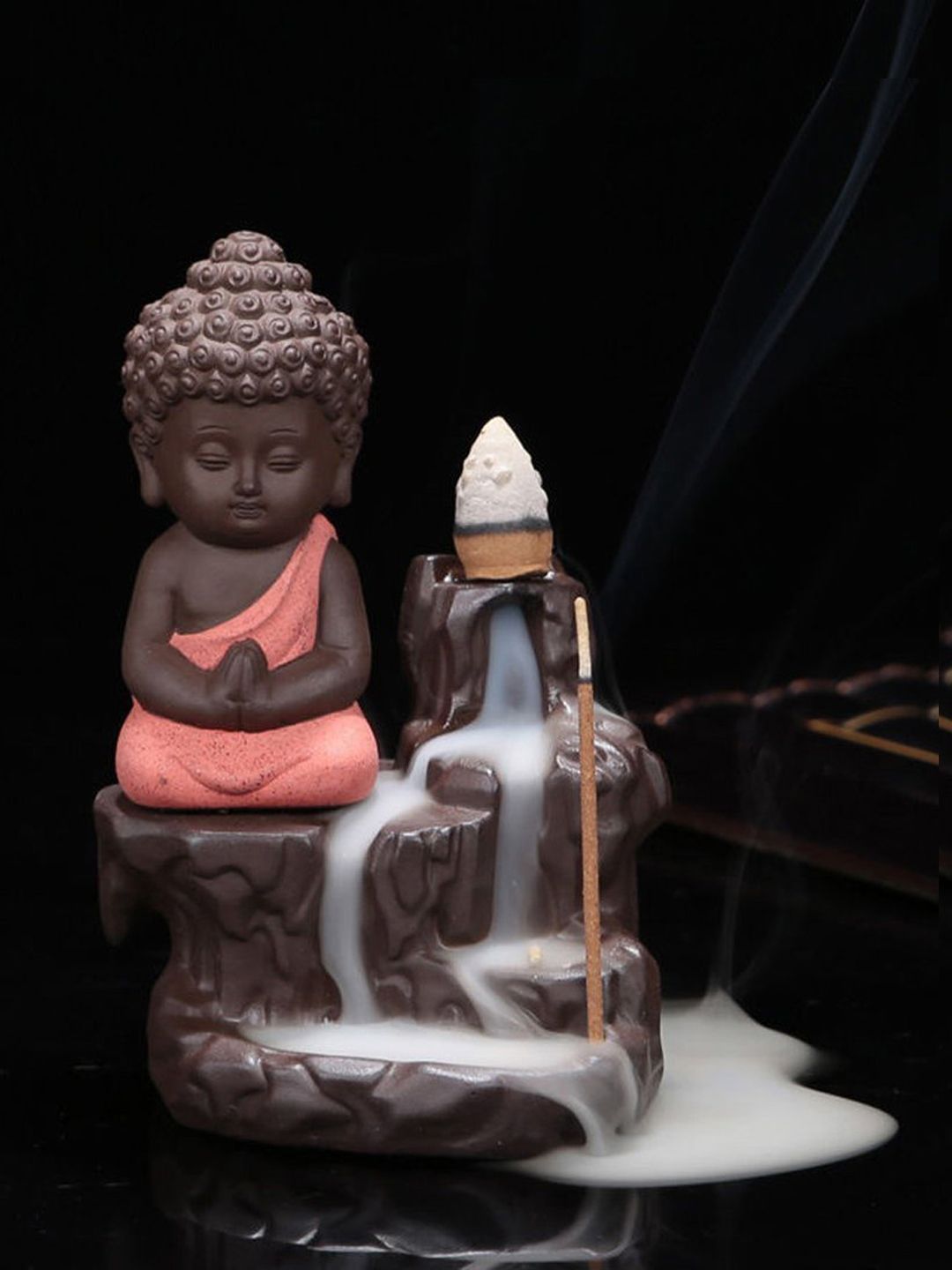 eCraftIndia Orange & Brown Buddha Smoke Fountain Showpiece Price in India