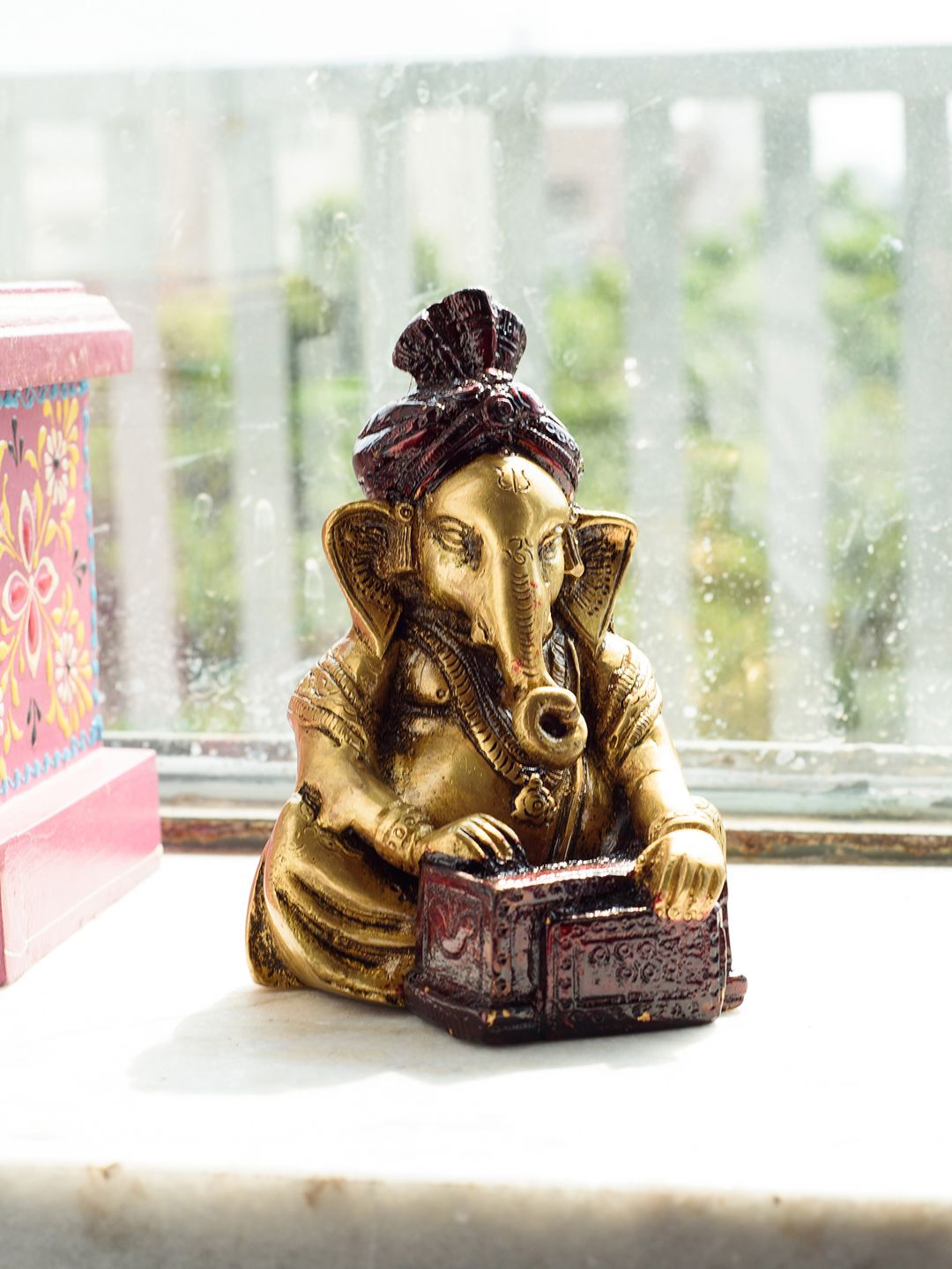 eCraftIndia Brown Lord Ganesha Playing Harmonium Showpiece Price in India