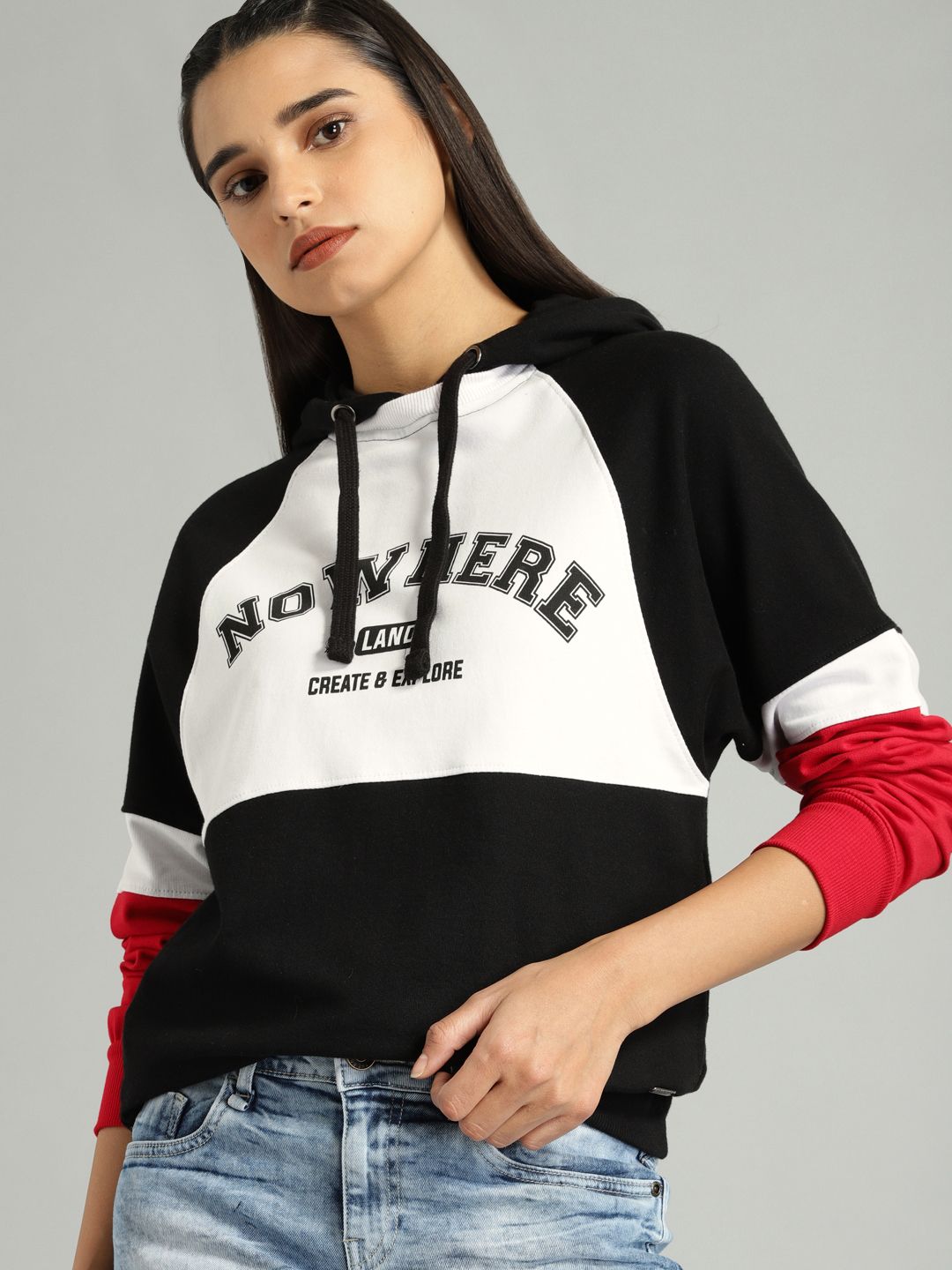 The Roadster Lifestyle Co Women Black & White Printed Hooded Sweatshirt Price in India