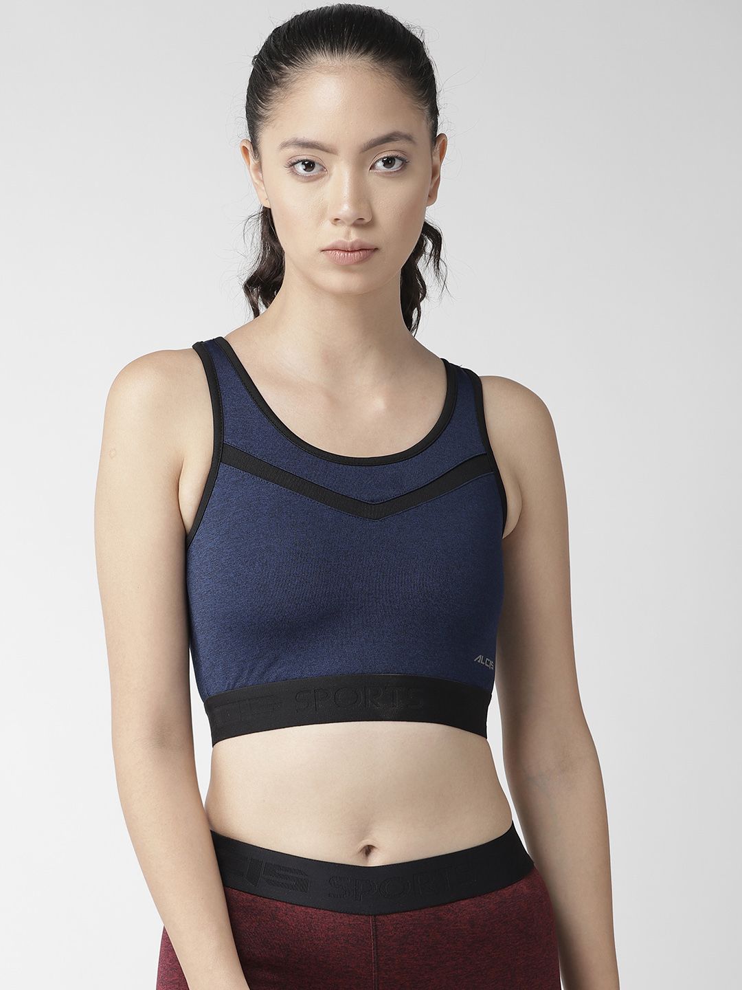 Alcis Women Navy Blue Solid Non-Wired Lightly Padded Running Sports Bra Price in India