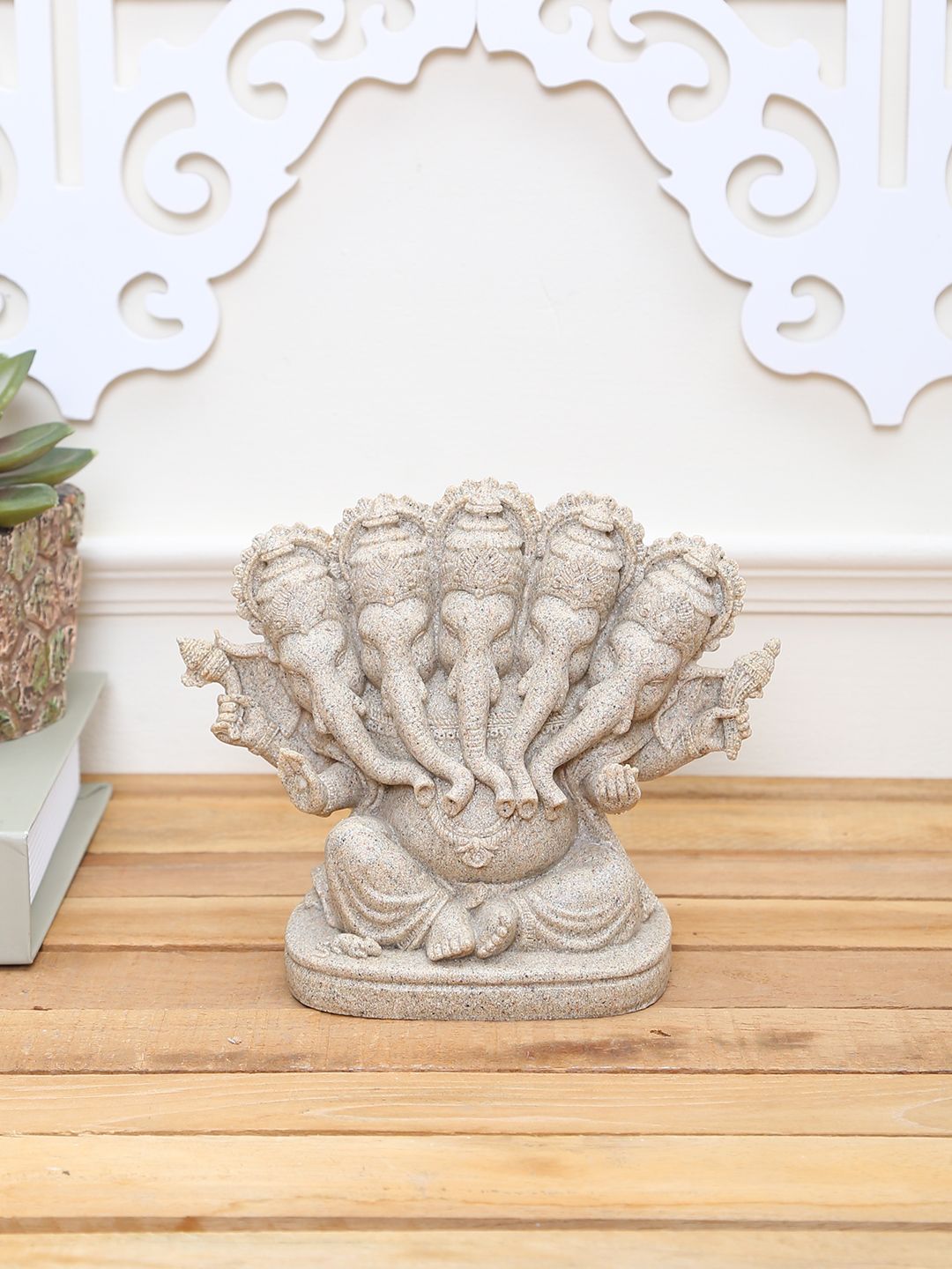 TAYHAA Grey Stone Dust Lord Ganesha Showpiece Price in India