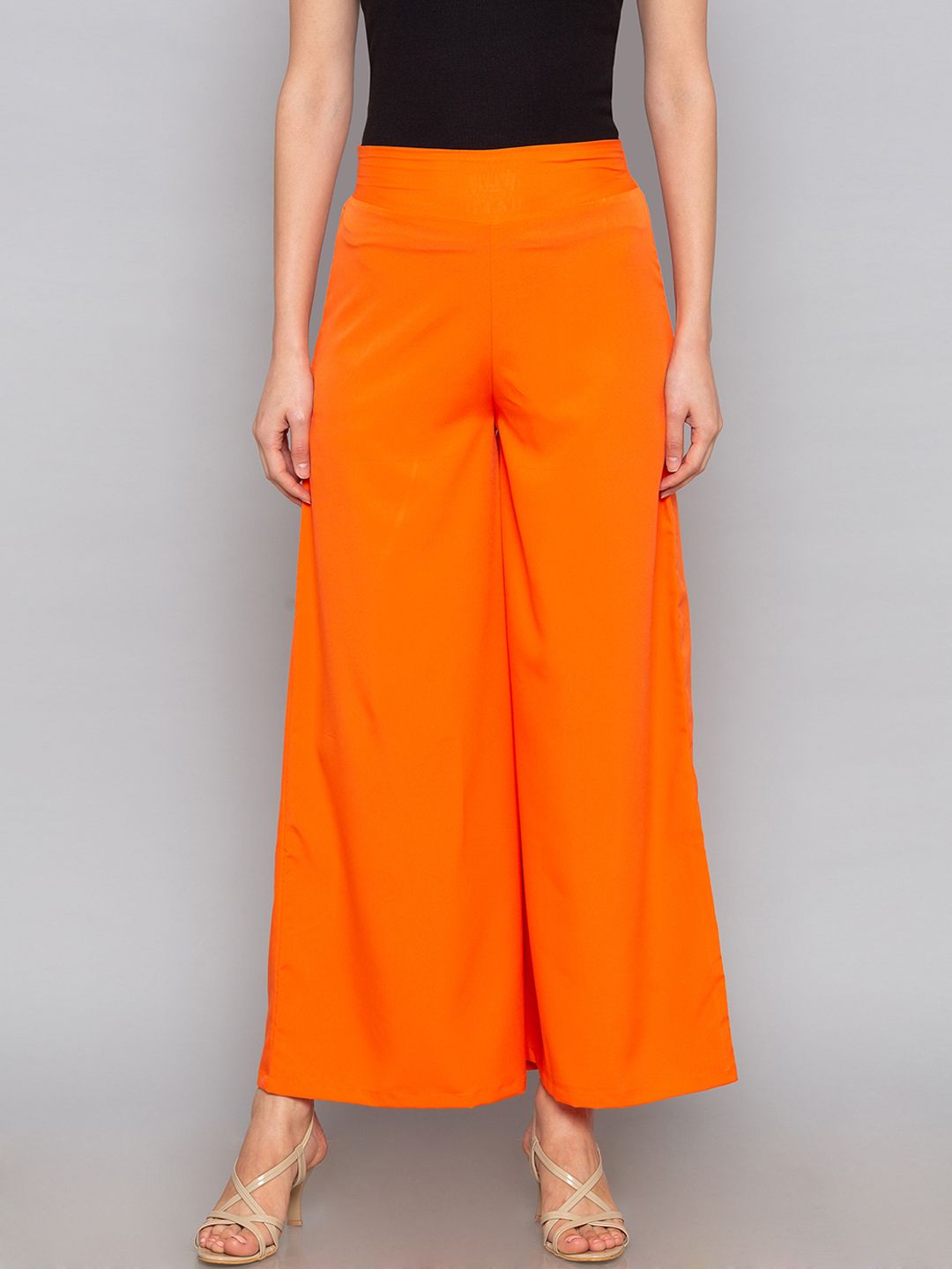 Desi Weavess Women Orange Solid Flared Palazzos Price in India