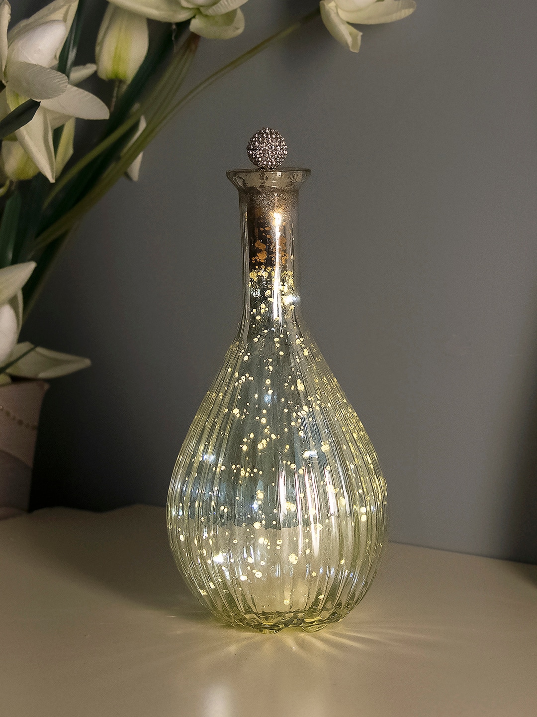 Homesake Silver-Toned Solid Handcrafted Ovoid Bottle Lamp Price in India