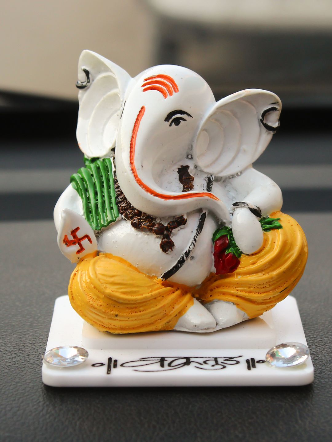 eCraftIndia White & Yellow Decorative Lord Ganesha Showpiece Price in India