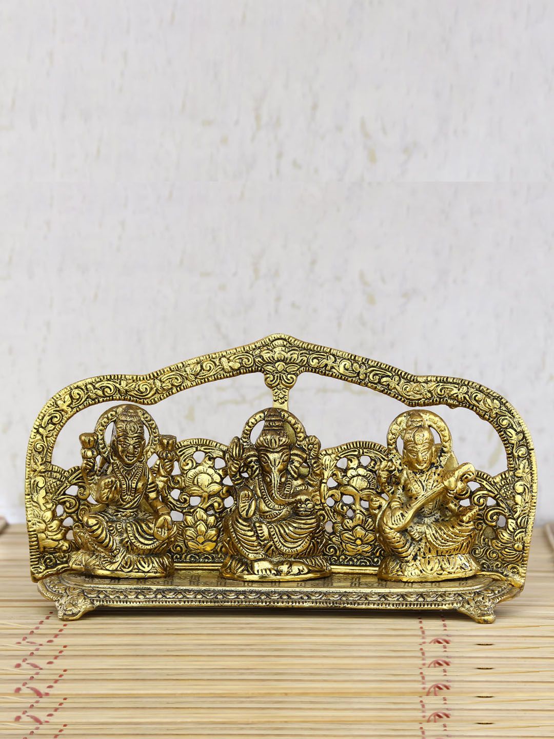 eCraftIndia Gold-Toned Laxmi Ganesha Saraswati Shining Religious Decorative Showpiece Price in India