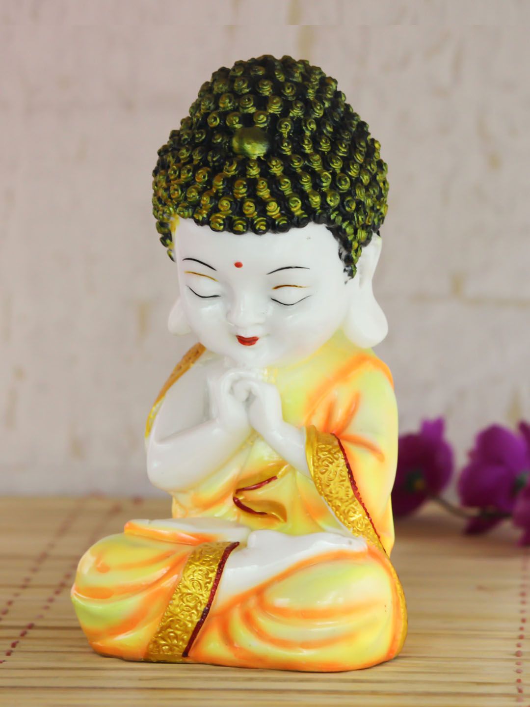 eCraftIndia White & Yellow Polyresin Praying Monk Buddha Showpiece Price in India