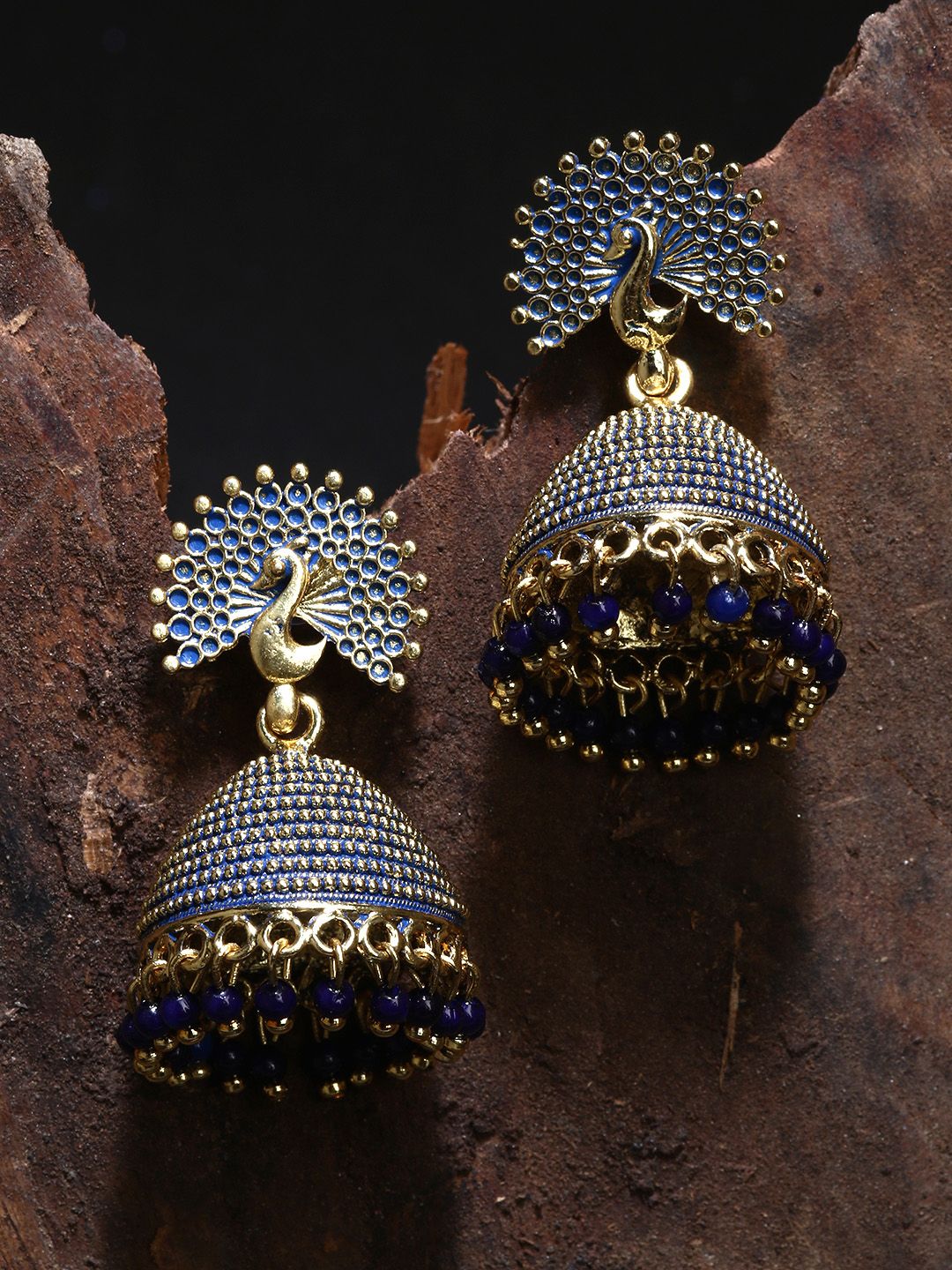 ANIKAS CREATION Gold Plated & Blue Enamelled Peacock Shaped Jhumkas Price in India