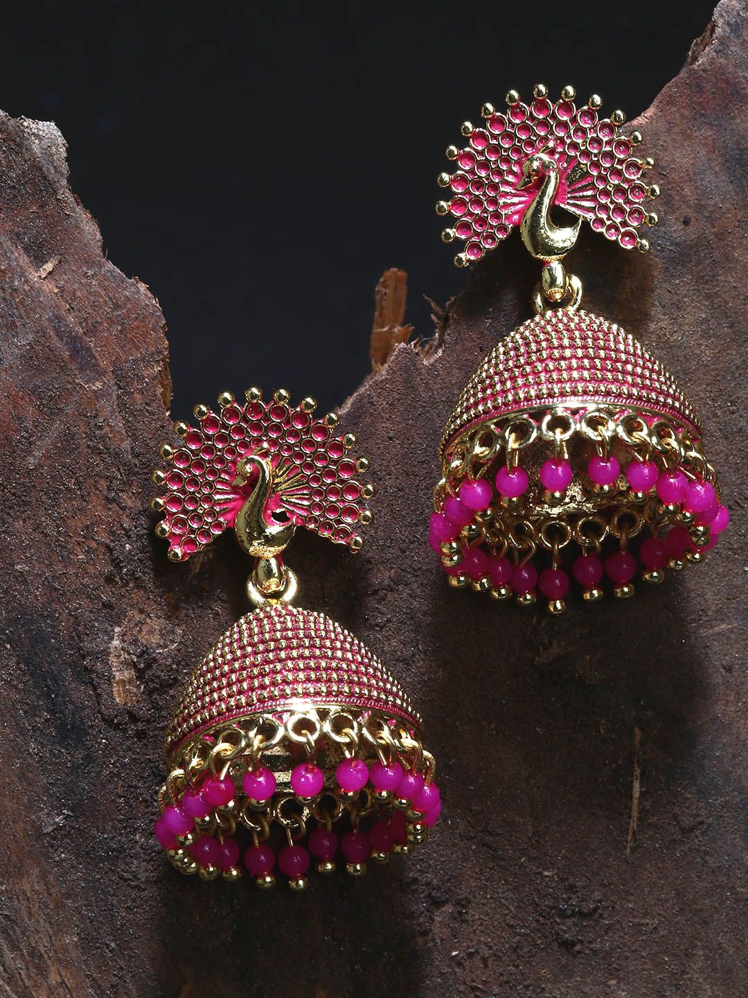 ANIKAS CREATION Gold Plated & Pink Peacock Shaped Enamelled Jhumkas Price in India