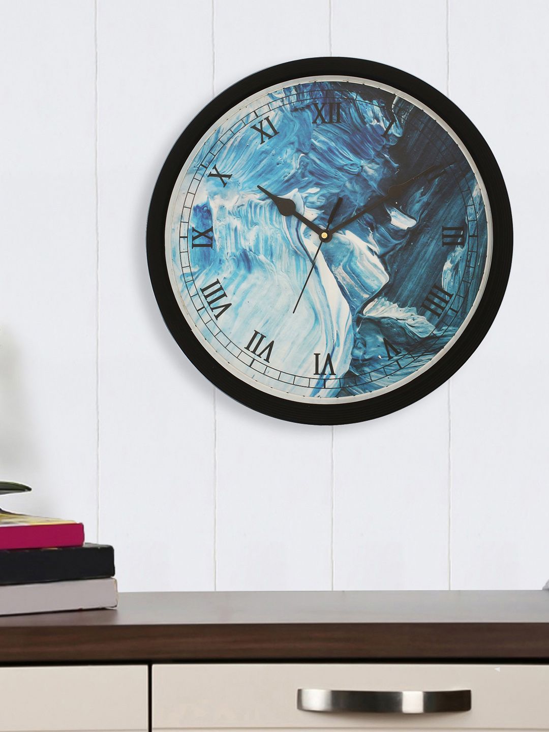 eCraftIndia Black & Blue Round Printed Analogue Wall Clock Price in India