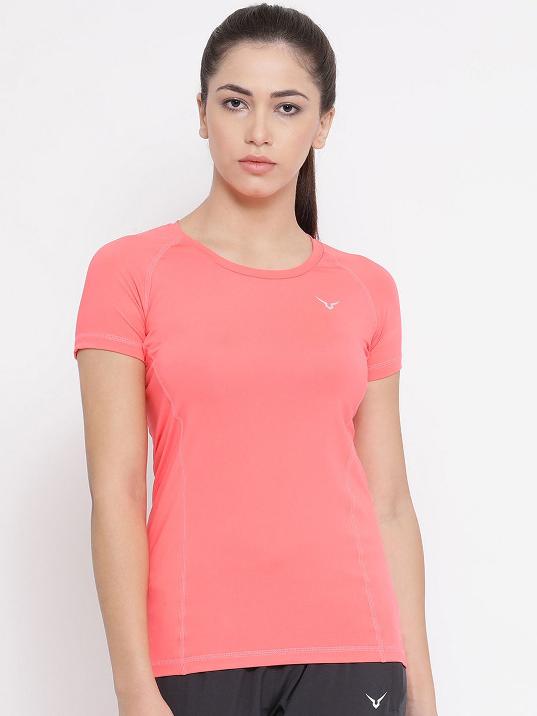 Invincible Women Pink Solid Round Neck T-shirt Price in India