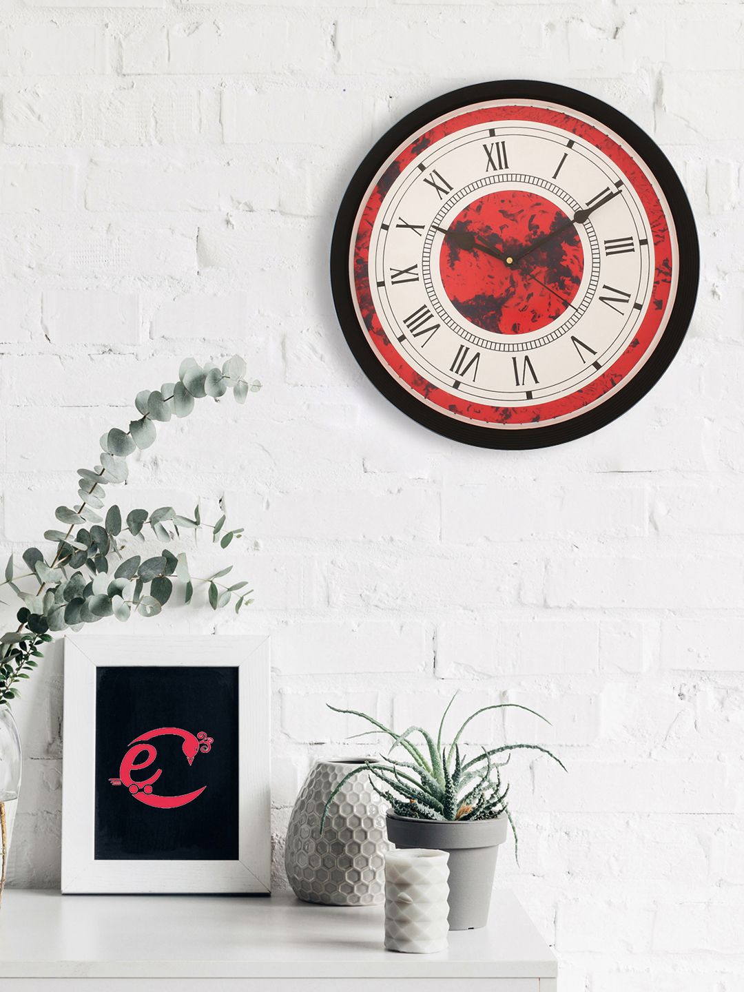eCraftIndia Black & Red Round Printed Analogue Wall Clock Price in India