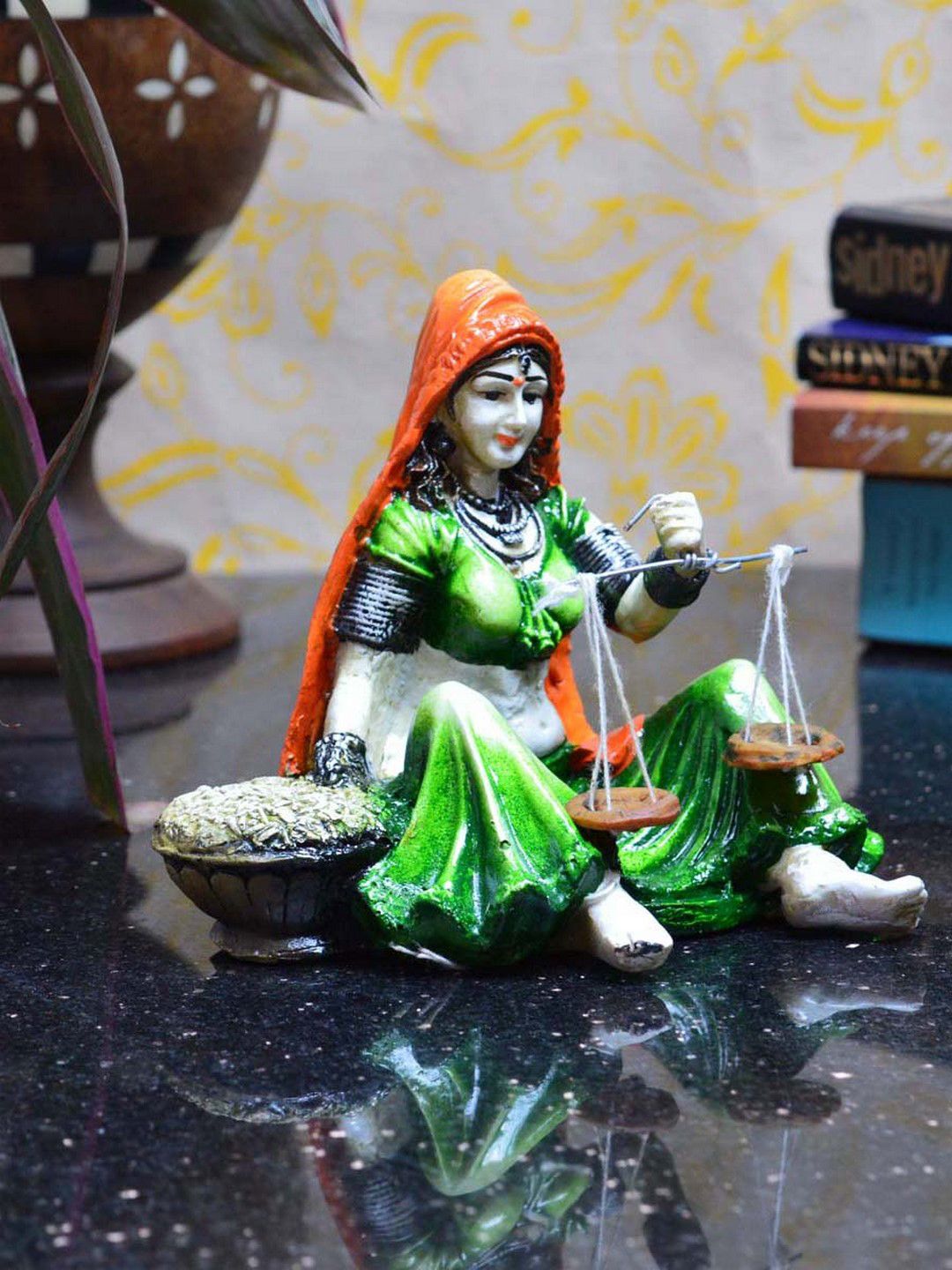 eCraftIndia Orange & Green Polyresin Rajasthani Lady Statue With Weighing Scale Showpiece Price in India