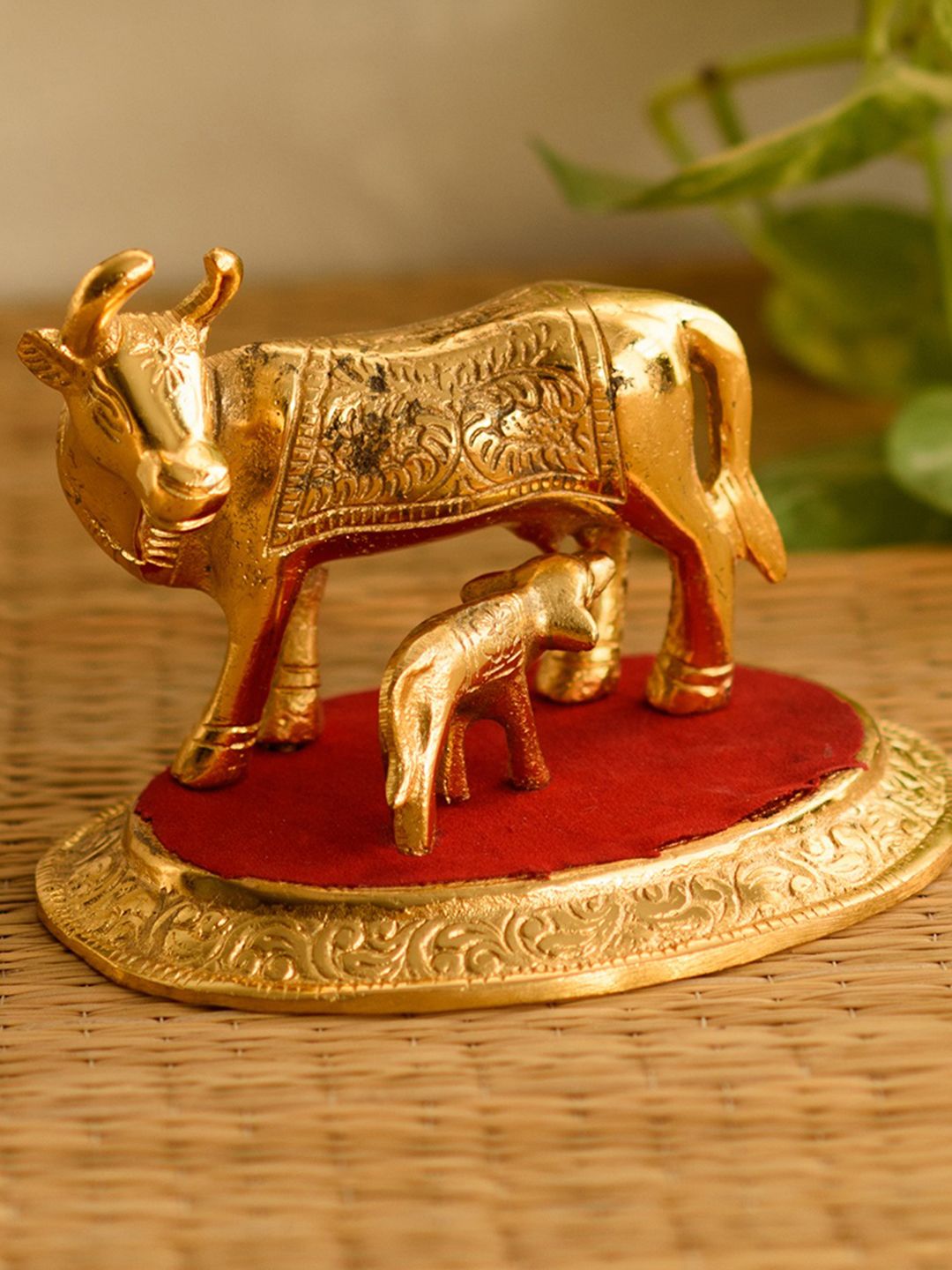 eCraftIndia Gold-Toned & Red Metal Cow with Calf Showpiece Price in India