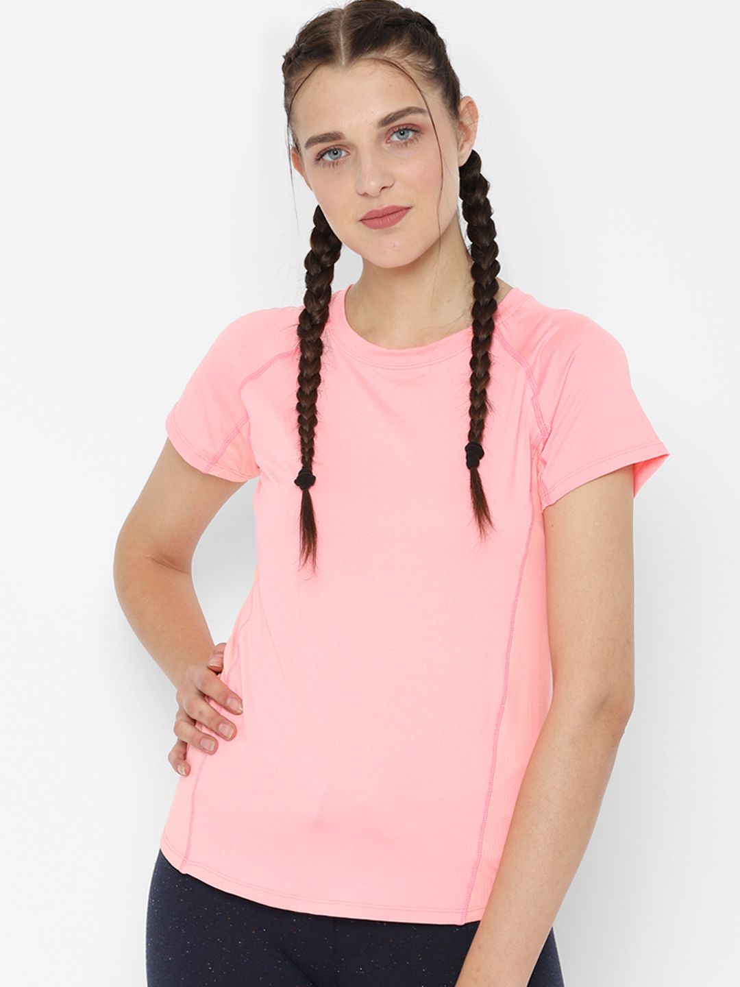 People Women Pink Solid Round Neck T-shirt Price in India