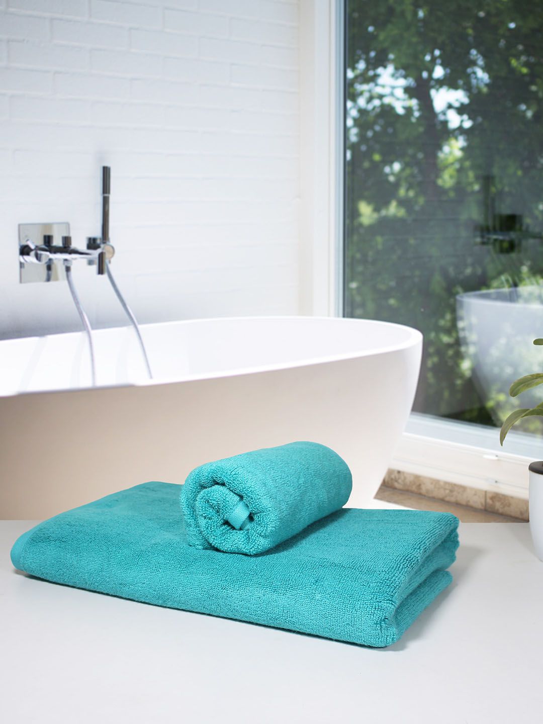 Heelium Set of 2 Turquoise Blue Solid 600GSM Quick Absorbent Hand & Bath Towels Price in India