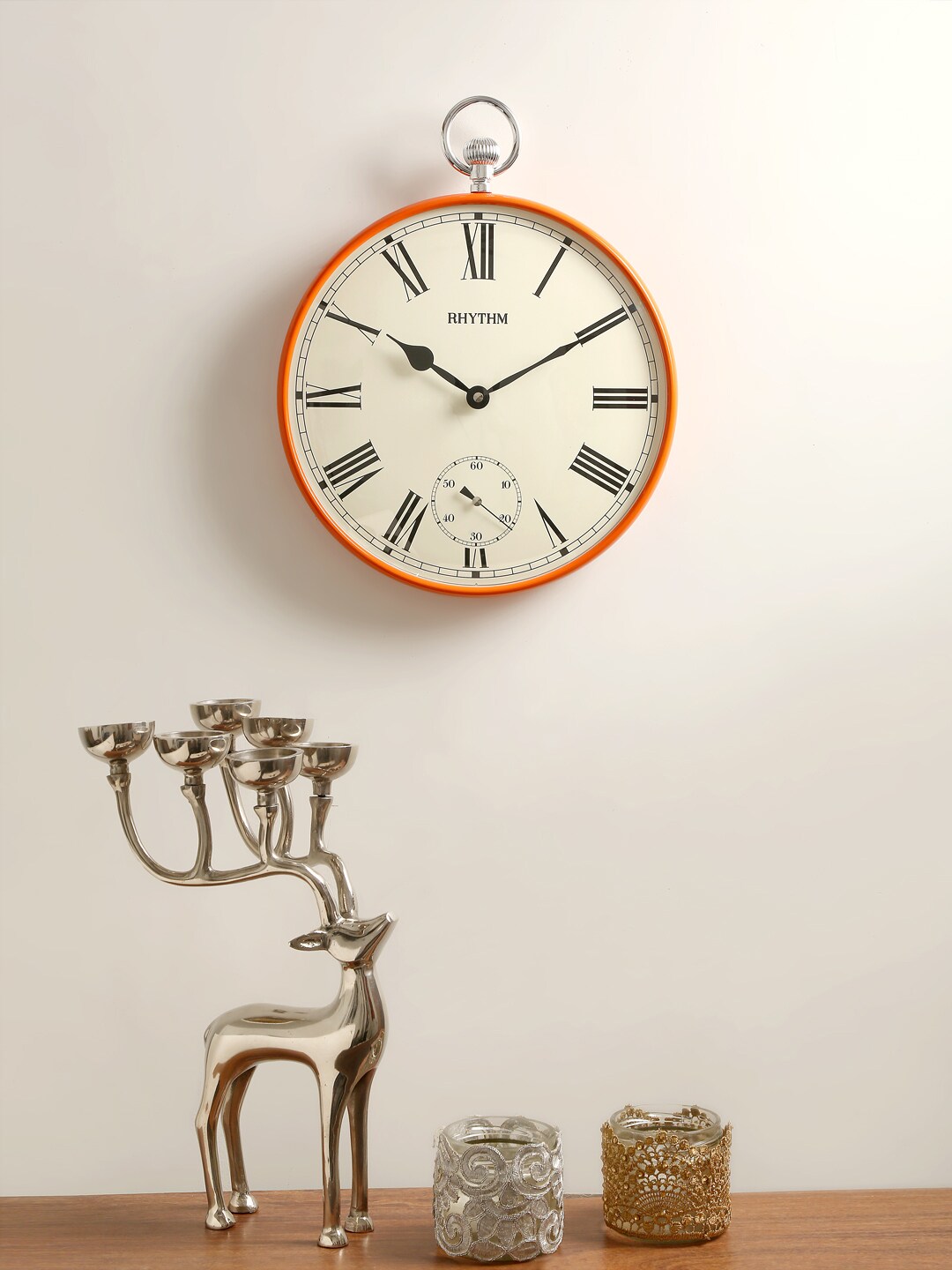 Rhythm White & Orange Handcrafted Round Solid Analogue Wall Clock Price in India