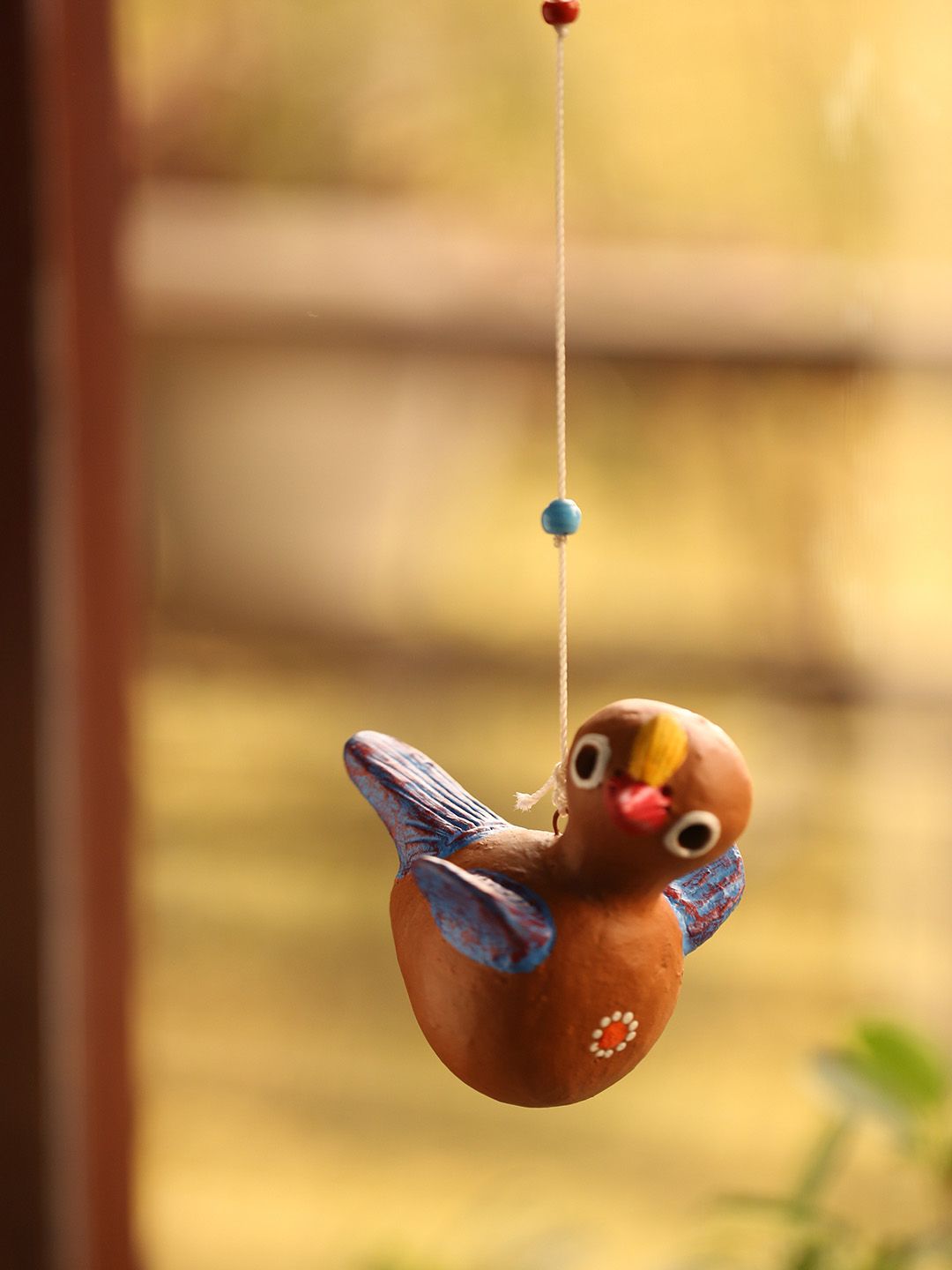 ExclusiveLane Brown Hand-Painted Chirping Cuckoo Terracotta Decorative Hanging Price in India