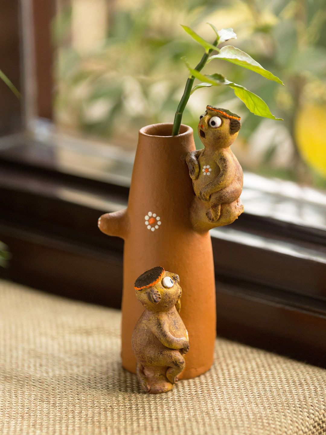 ExclusiveLane Brown Terracotta Hand-Painted Chattering Monkey Showpiece Price in India