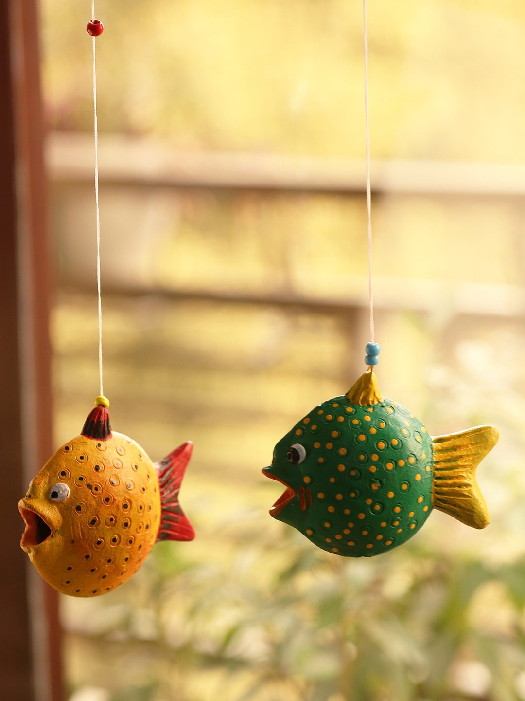 ExclusiveLane Set of 2 Green & Yellow Hand-Painted Happy Fish Terracotta Hangings Price in India
