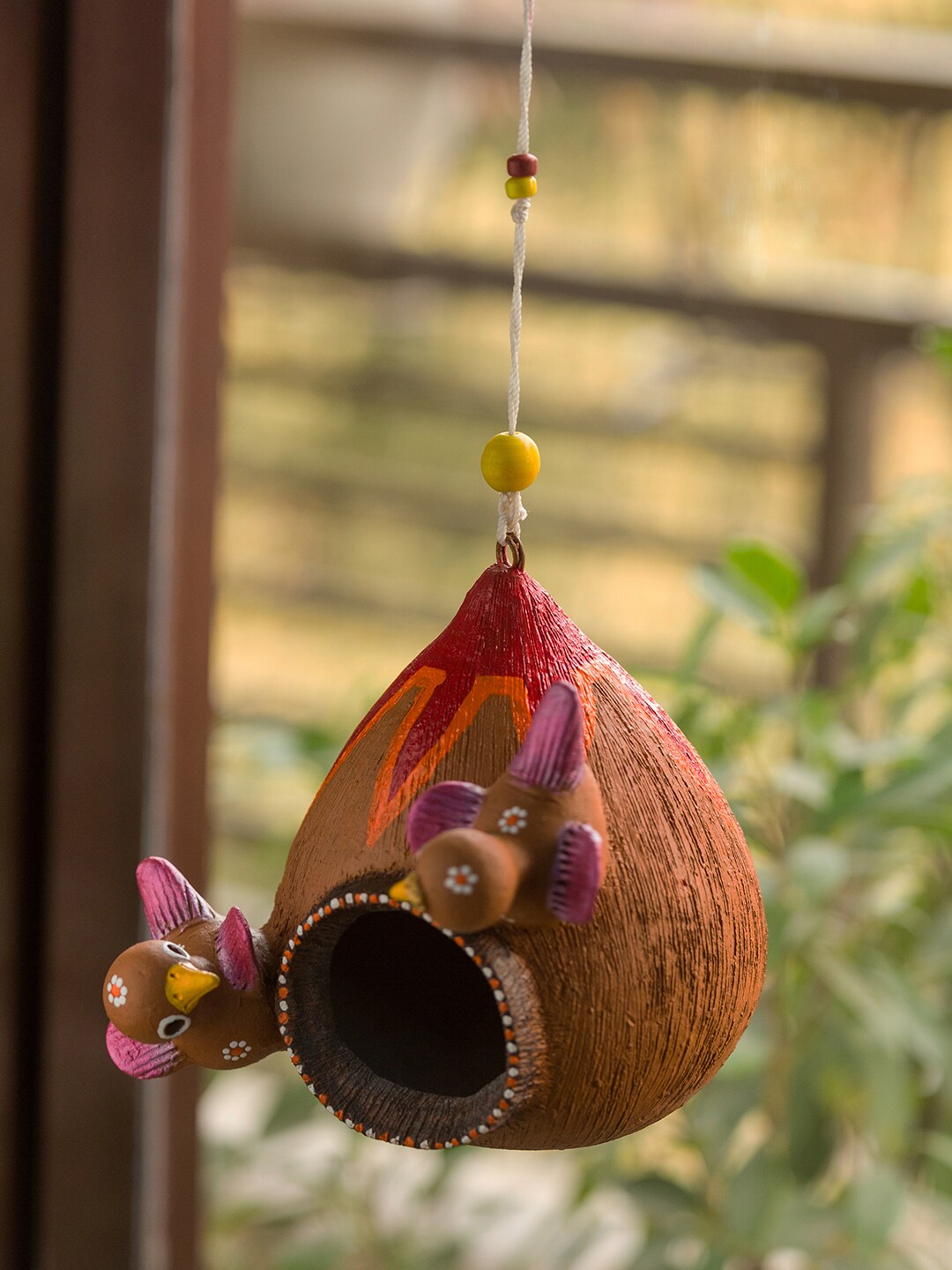 ExclusiveLane Brown Hand-Painted Cuckoo Family Terracotta Bird House Price in India
