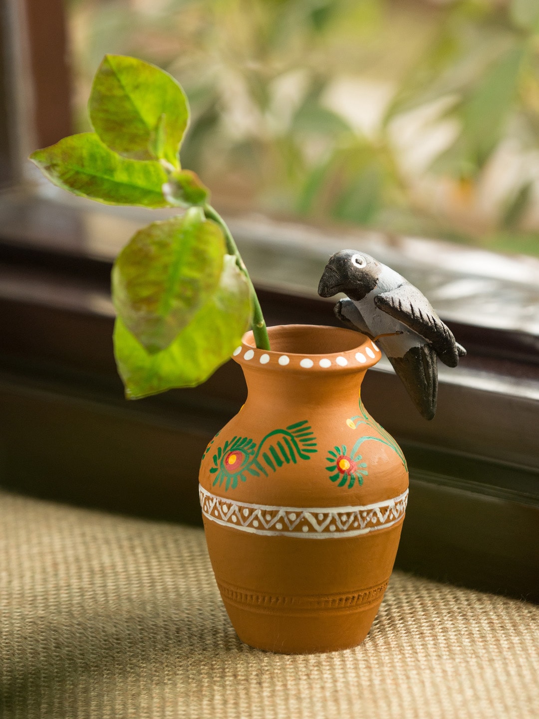 ExclusiveLane Brown & Black Hand-Painted The Thirsty Crow Garden Terracotta Showpiece Price in India