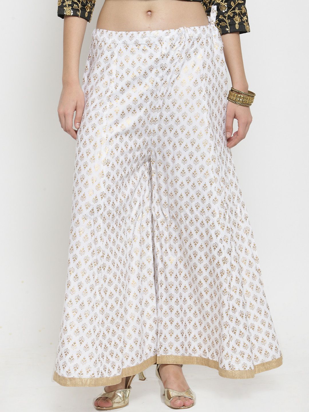 Clora Creation Women White & Gold-Toned Flared Printed Palazzos Price in India