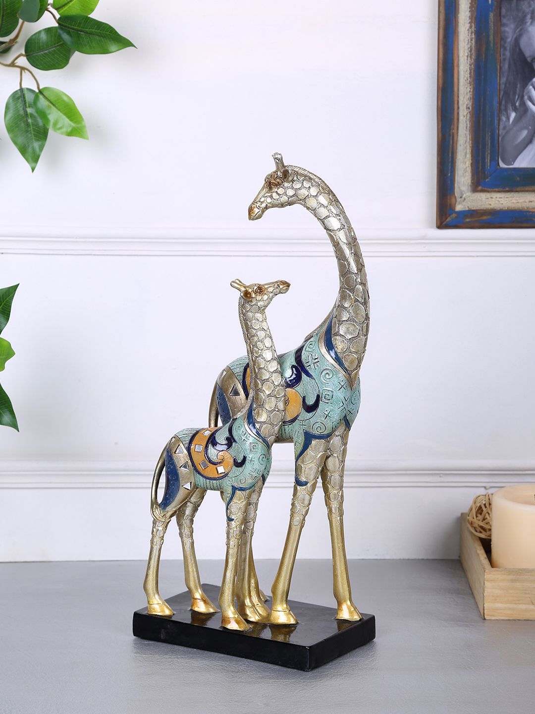 TAYHAA Gold-Toned & Blue Resin Giraffe Statue Price in India