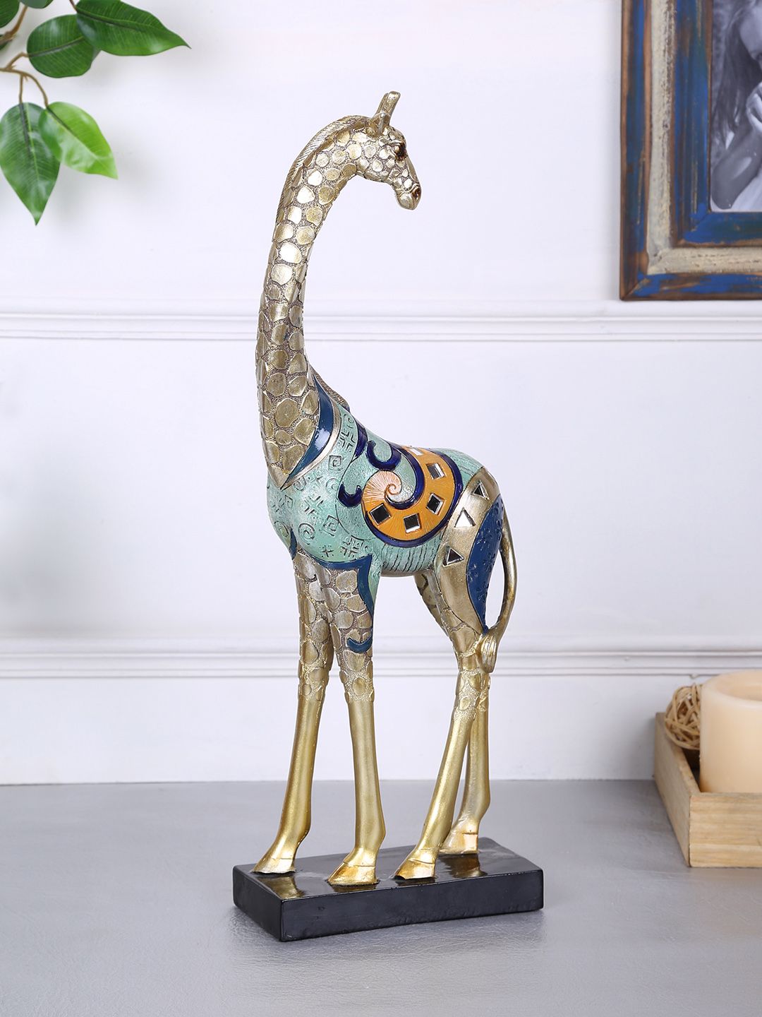 TAYHAA Gold-Toned & Blue Resin Giraffe Statue Price in India