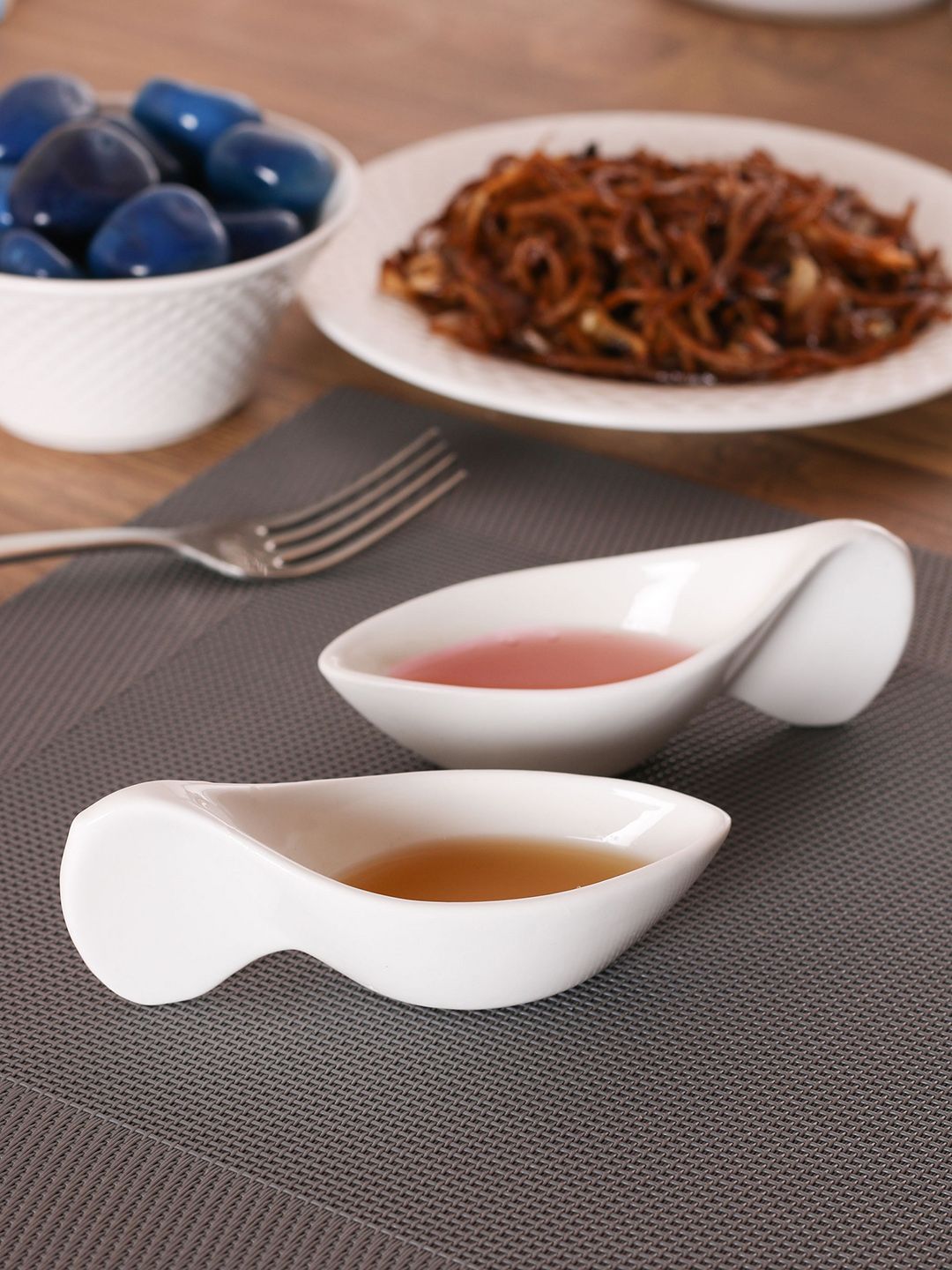 CLAY CRAFT White Set of 4 Tail-Shaped Dipping Bowls Price in India
