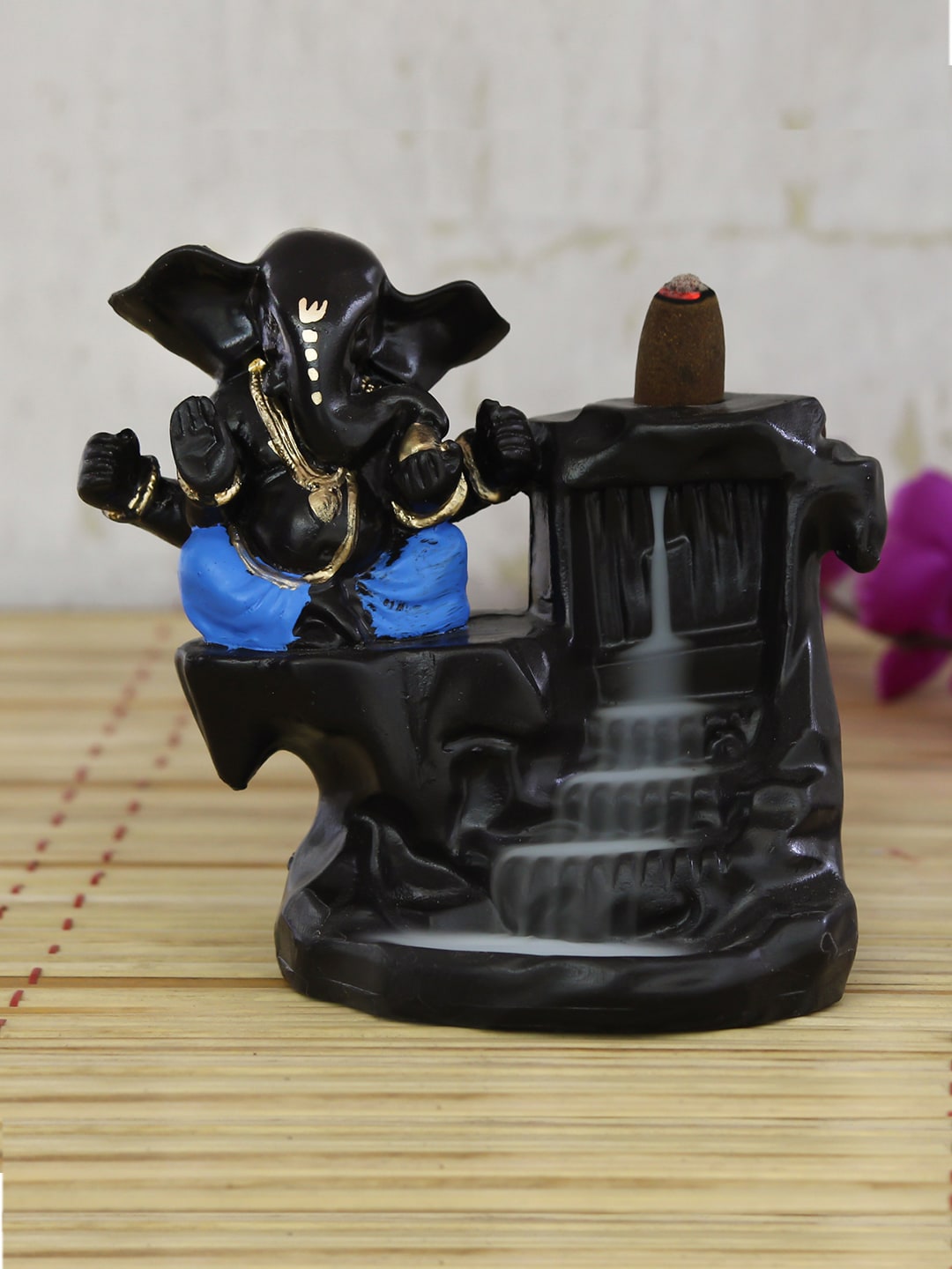 eCraftIndia Blue & Black Ganesha Smoke Fountain Showpiece Price in India