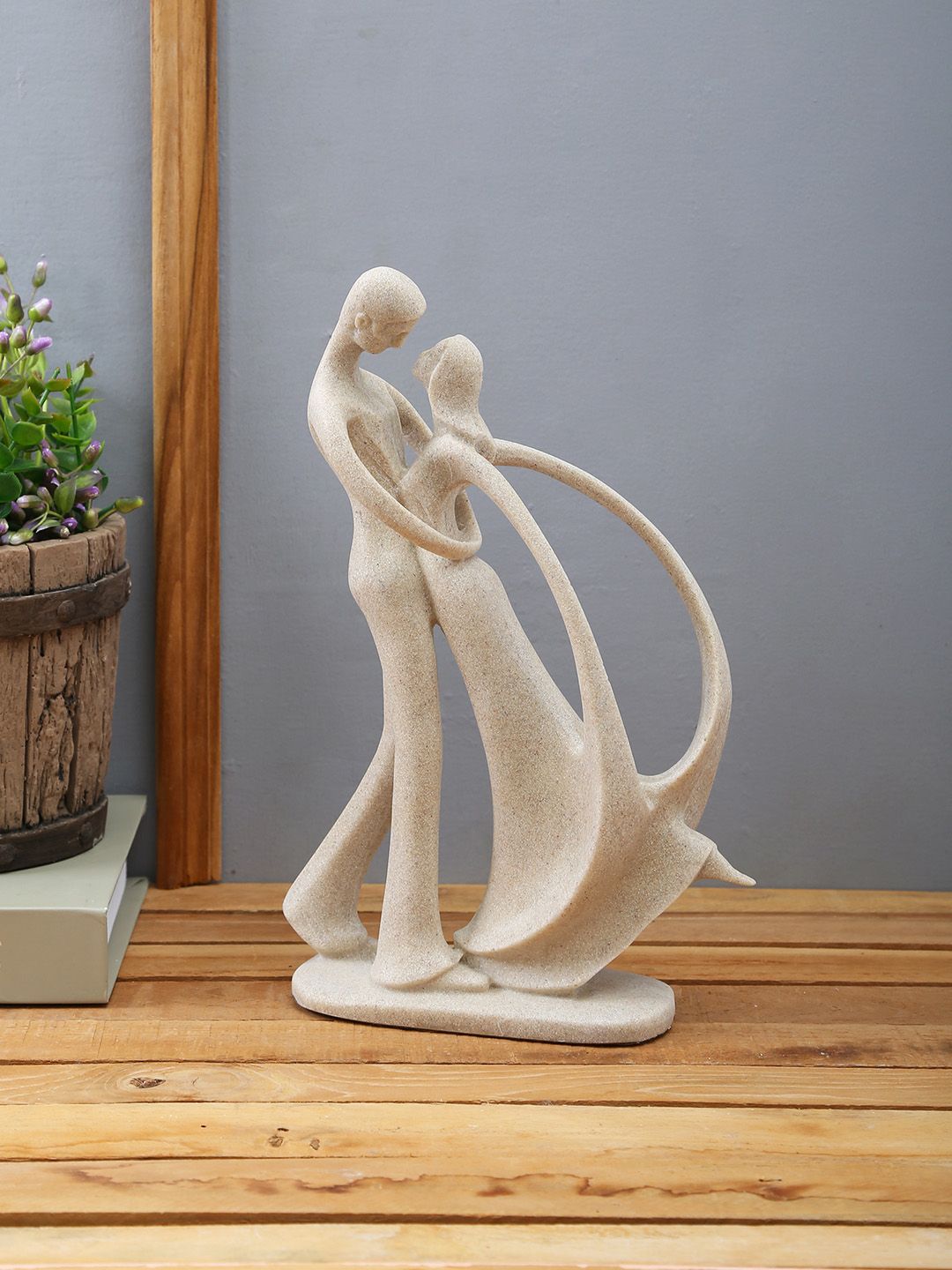 TAYHAA Beige Couple Mesmerized In Love figurine Price in India