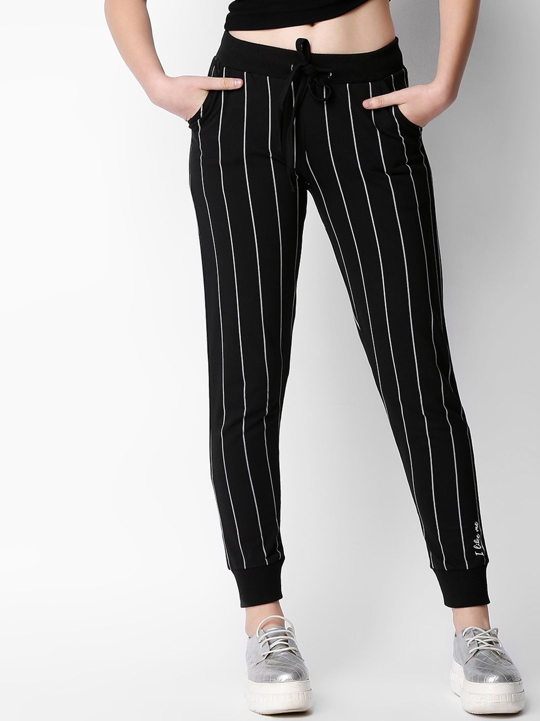 I like me Women Black Striped Slim-Fit Track Pants Price in India