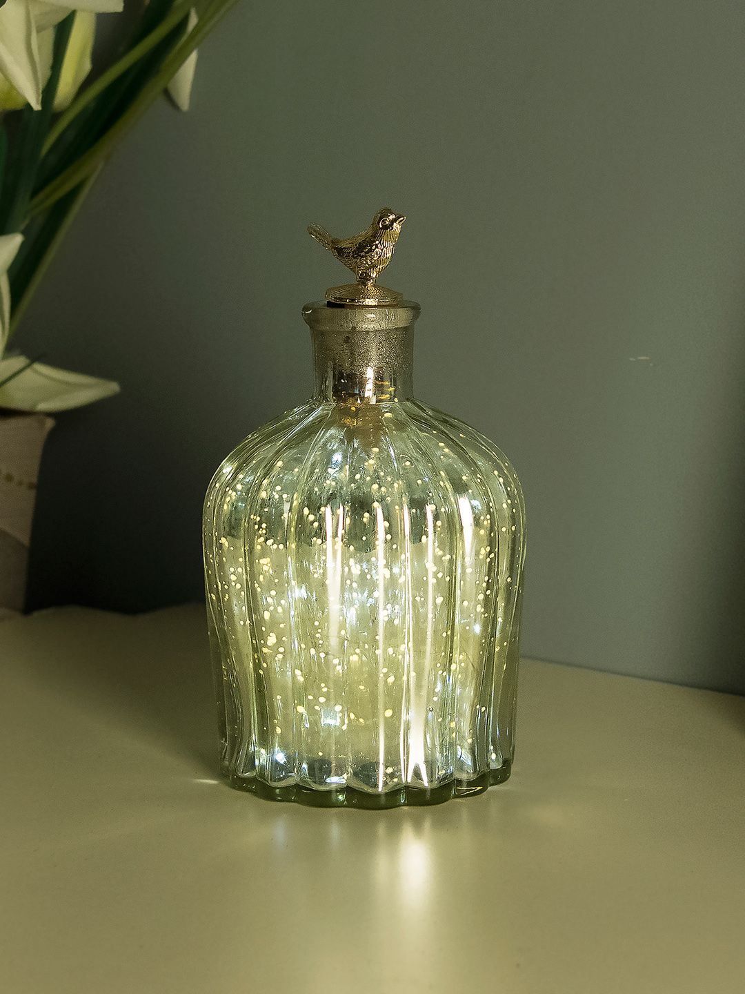 Homesake Silver-Toned Solid Handcrafted Flat Base Bottle Lamp Price in India