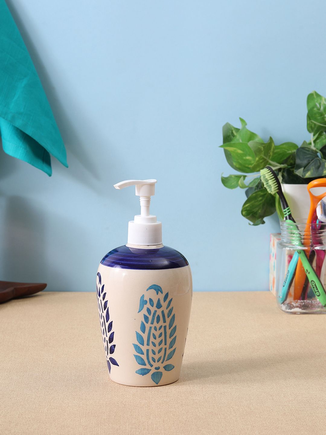 VarEesha Off-White & Blue Printed Ceramic Liquid Soap Dispenser Price in India