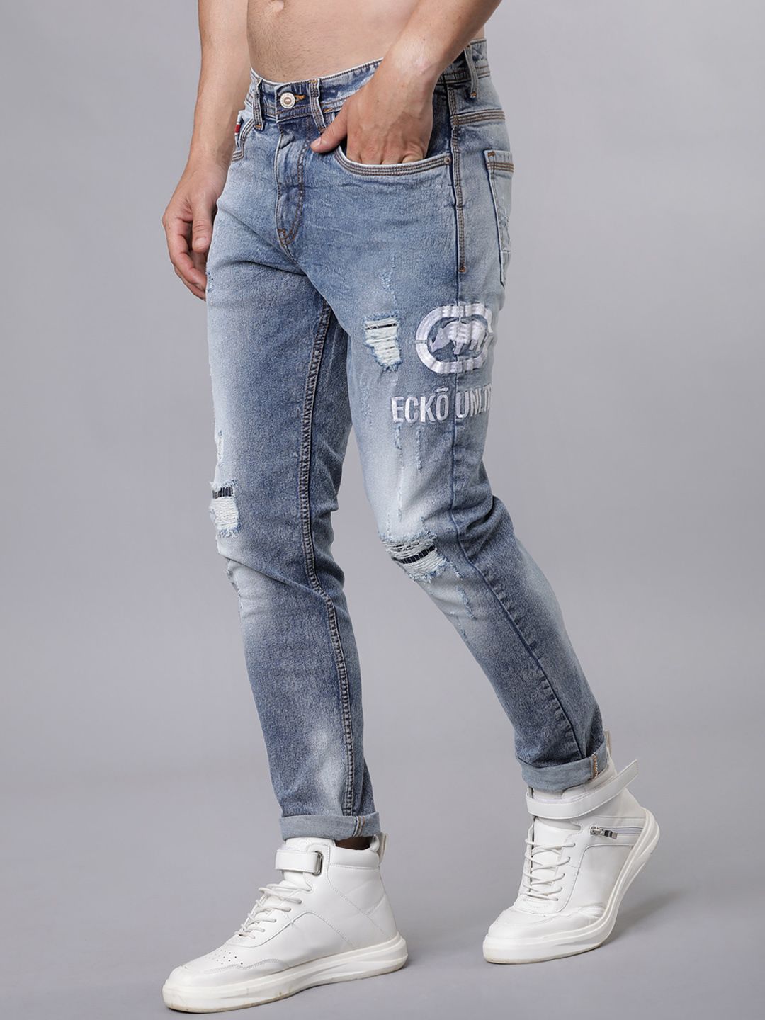 Ecko Unltd Men Blue Tapered Fit Mid-Rise Mildly Distressed Stretchable Jeans